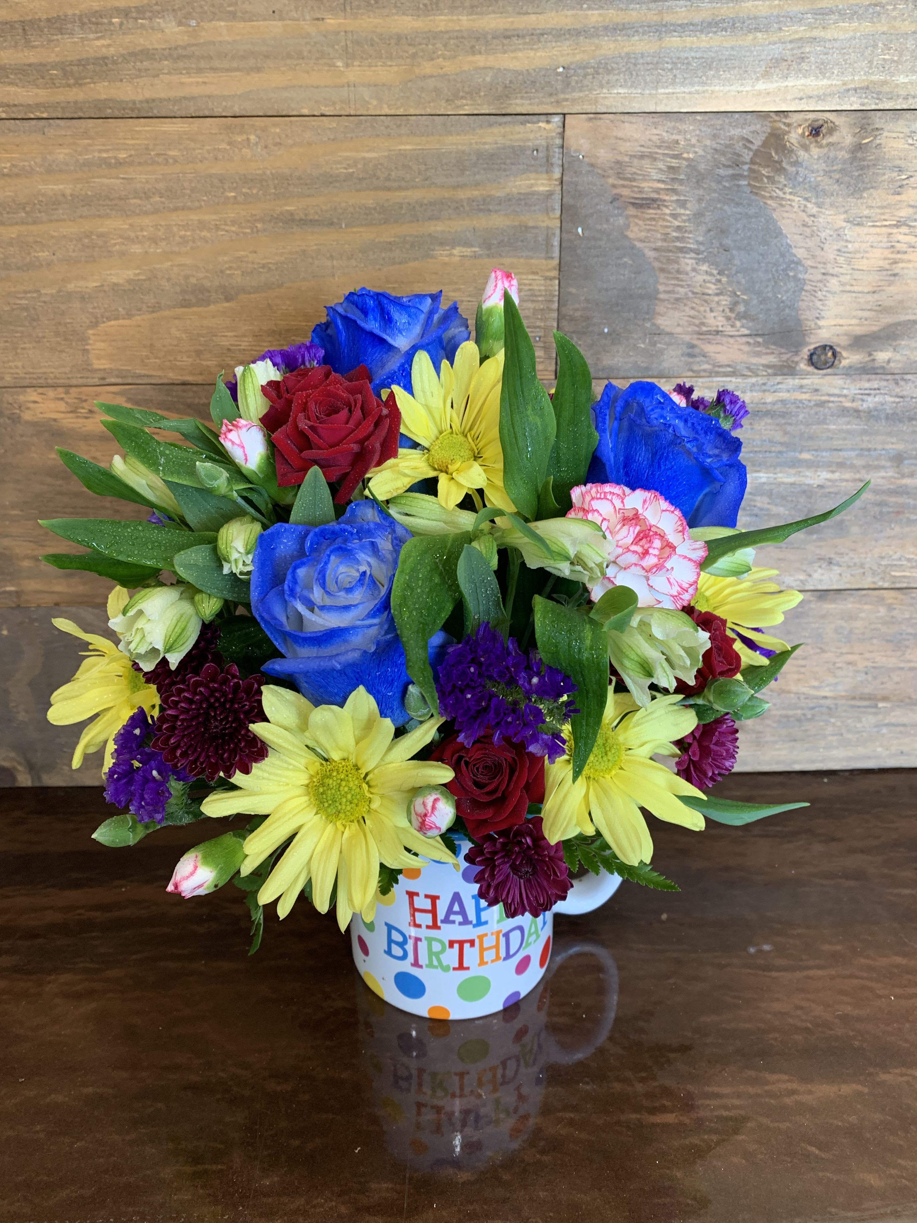 Happy Birthday Mug - Cute mug filled with festive blooms to make anyone’s birthday extra special.