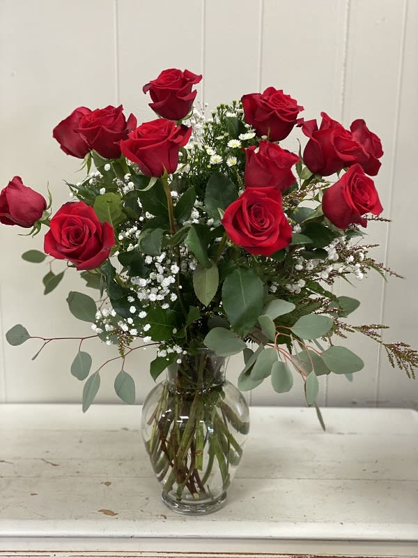 My True Love- Red Long Stemmed Roses - Your devotion, delivered. Surprise your special one with this gorgeous arrangement of one dozen long stem red roses. It's a timeless testimony of your love she won't soon forget. (Can be arranged in other colors)