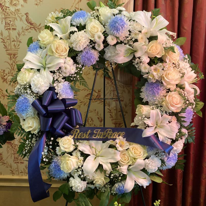 Rest In Peace Wreath Rest In Peace Wreath - This beautiful wreath stands as a testament to the circle of life that must be acknowledged even in our saddest moments. It will surely be appreciated by all in attendance. Banner-Ribbon included in deluxe and premium styles.