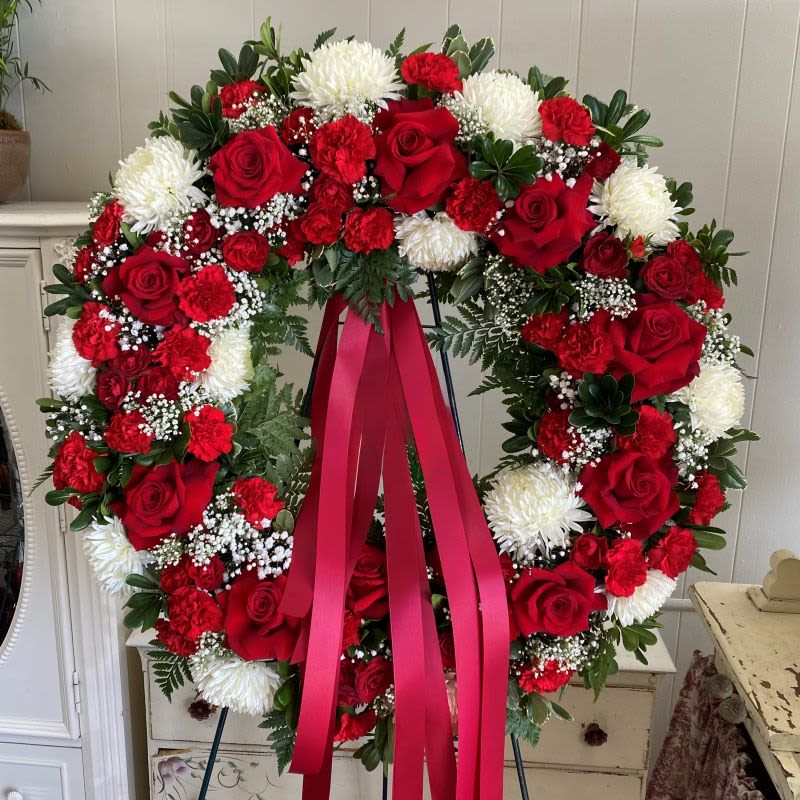 Peace And Prayer Wreath Peace And Prayer Wreath - The memory of brighter days is always a comfort to those in mourning. This lovely wreath will display your compassion beautifully.