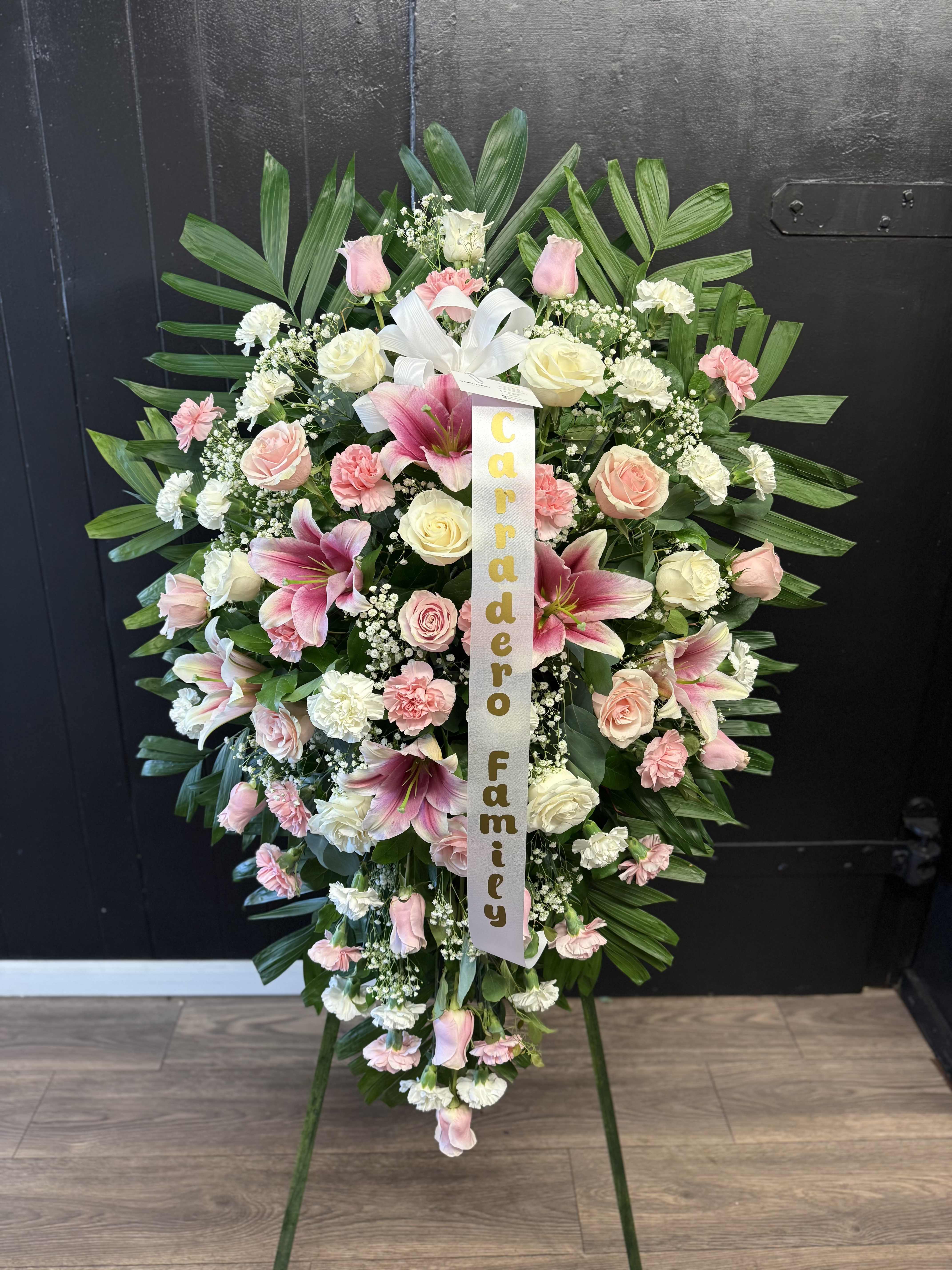 pink funeral of memories pink funeral of memories - This funeral is a very large funeral with beautiful colors in shades of pink and white. It is a very nice convination. This funeral has pink and white roses. Pink lilies. Baby's breath. Pink and white carnations.