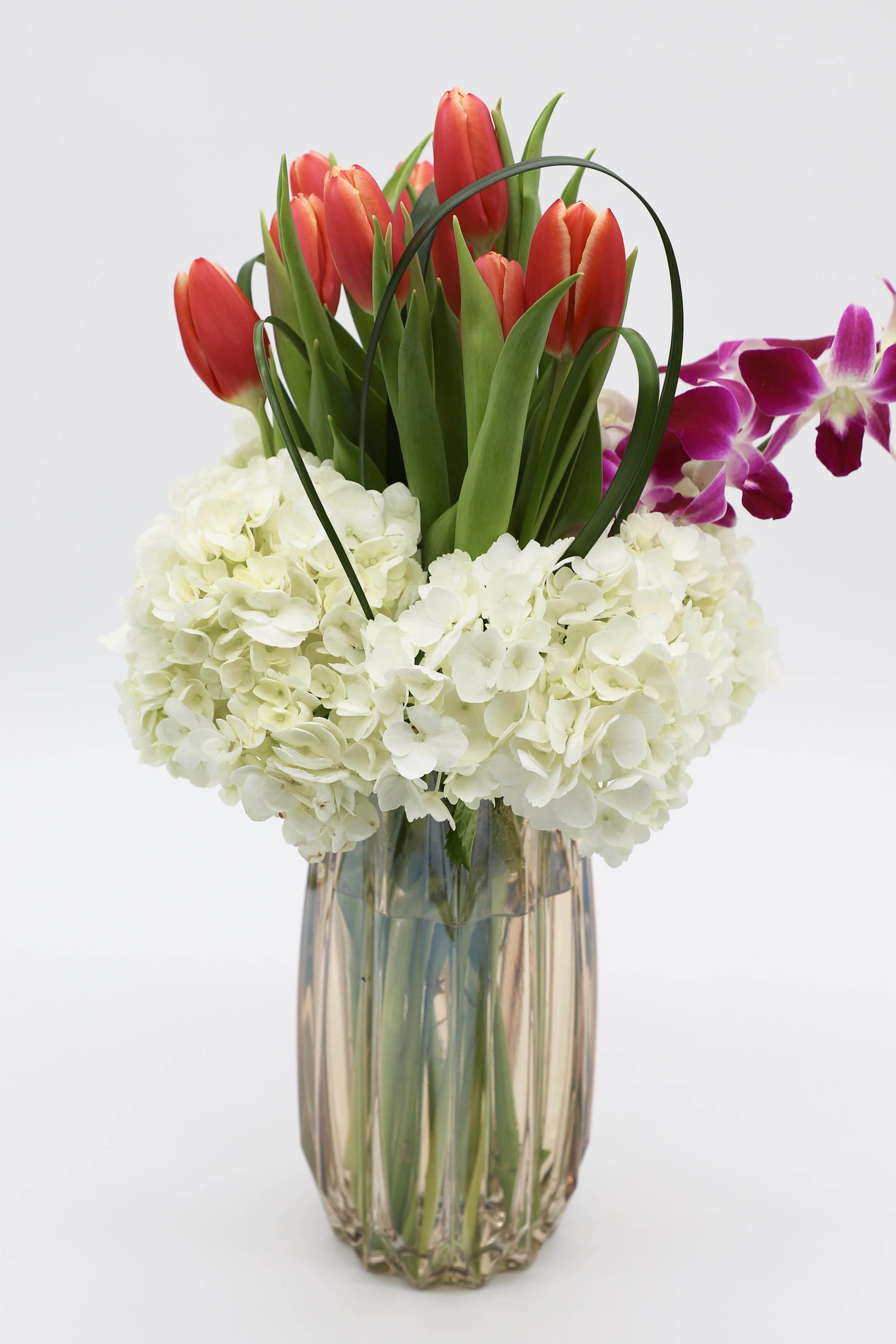 Cherish You - A vintage styled glass with carefully placed hydrangea, tulips, and dendrobium orchids.