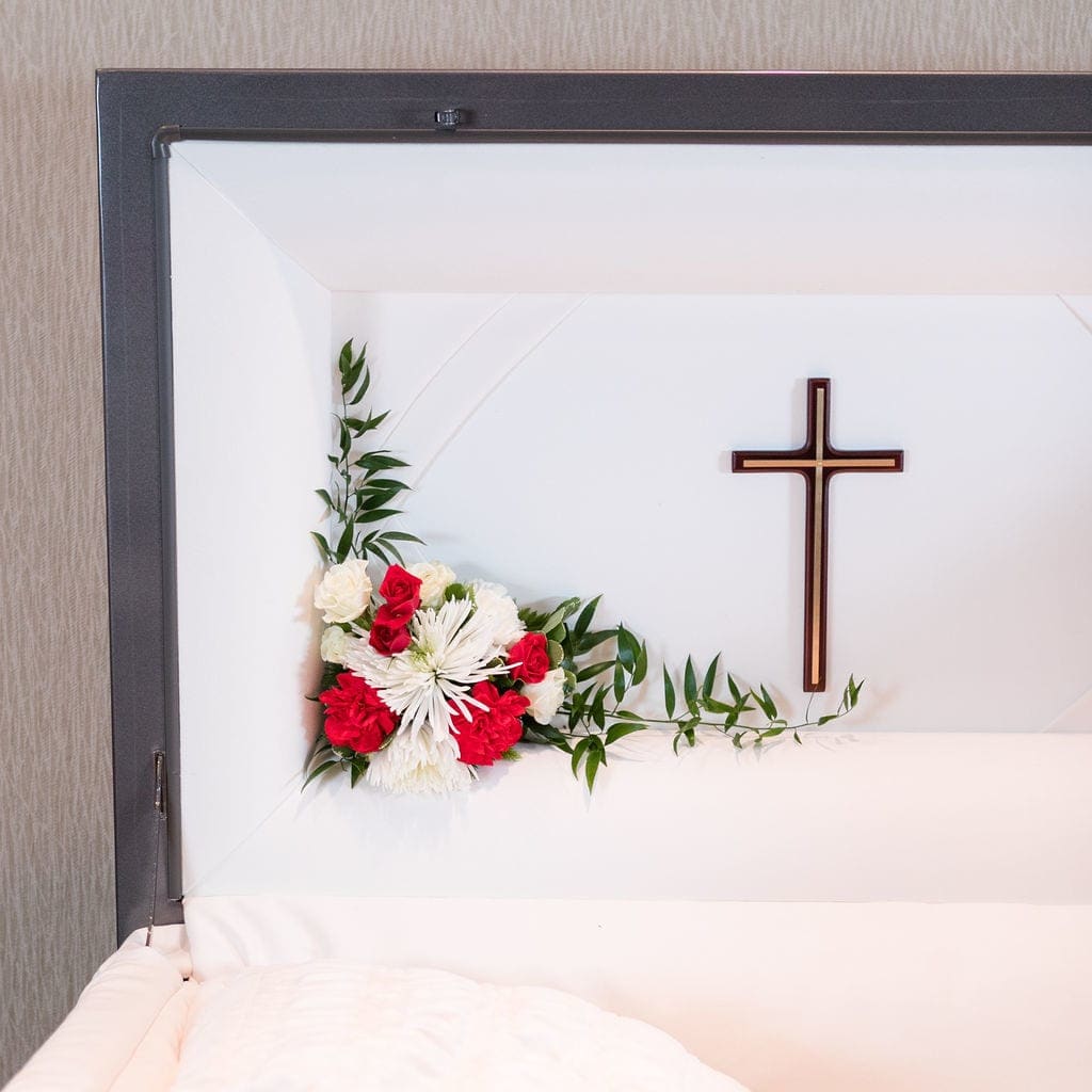 Dedication - A sweet, white and red piece to gracefully adorn the corner of the casket.  Approximate Dimensions: 8&quot;T X 14&quot; W