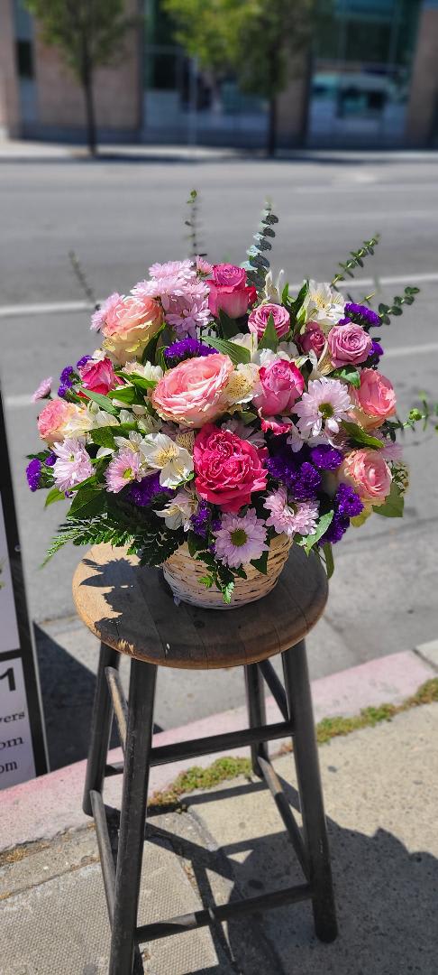 Little Basket of Love - There’s a large range of colors in this one sided Lil basket of love, and it proves that a great flower gift for mom doesn’t have to be enormous in order to be effective. Roses, Asters, Daisy's, Statice , and more makes this a collection of flowers mom will definitely enjoy