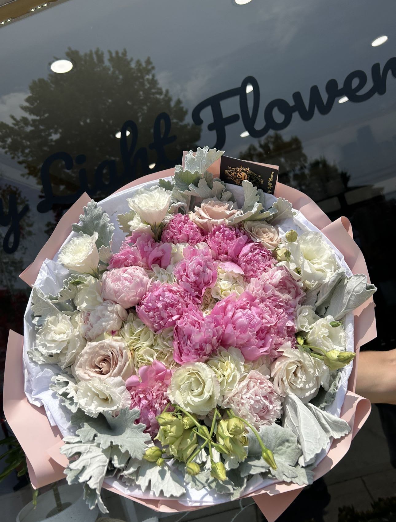 Whispering peonies Whispering peonies - Brighten any space with our Elegant Flower Bouquet! Bursting with vibrant blooms, this stunning arrangement features seasonal favorites paired with lush greenery for a breathtaking display. Perfect for any occasion, it makes an ideal gift or a special treat for yourself. Elevate your decor with this captivating bouquet that brings joy and sophistication to your home or office. Order yours today and let the beauty of flowers inspire you!