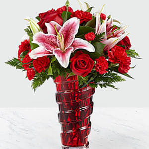 Higher Love Bouquet Higher Love Bouquet - Sometimes you need to send a message that comes straight from the heart. The combination of soft pink stargazer lilies, red carnations, and rich red roses delivers the message of "I love you" from deep within each petal. GOOD bouquet is approx. 15"H x 13"W. BETTER bouquet is approx. 17"H x 15"W. BEST bouquet is approx. 18"H x 16"W.