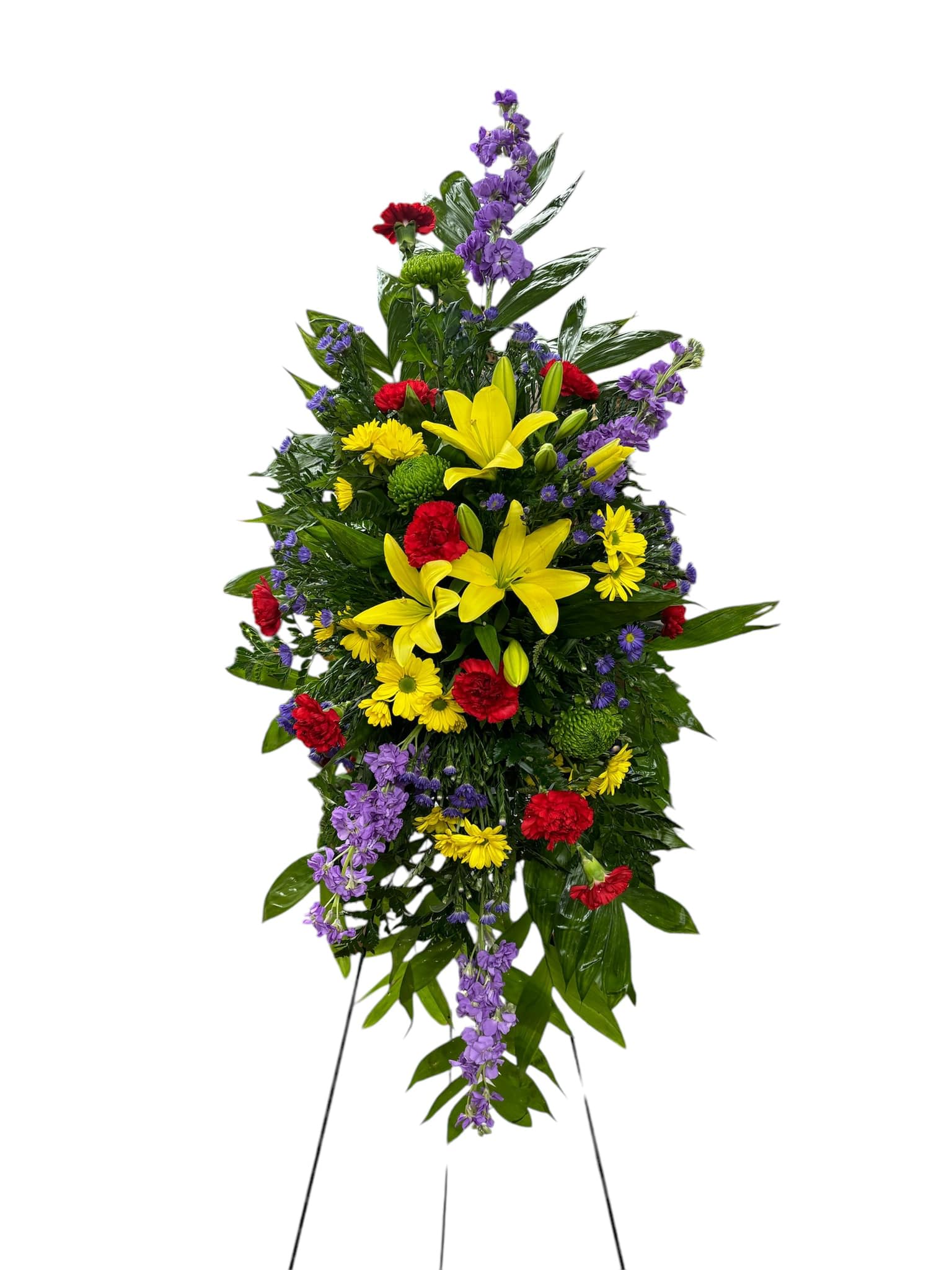 A Final Tribute Spray - This Final Tribute spray consists of Purple stock, yellow Asiatic lilies, carnations, fuji mums, statice and daisies.