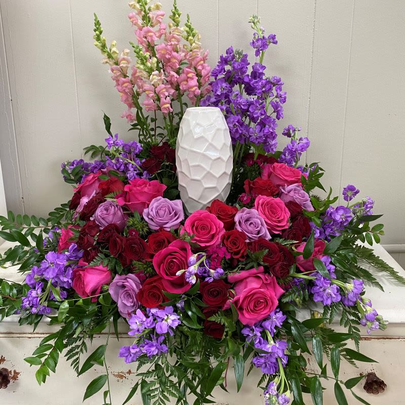 Celebration of Life Urn Surround Celebration of Life Urn Surround - Vibrant and jewel tones of pinks, reds, purple blooms surround the urn, like a graceful celebration of life.