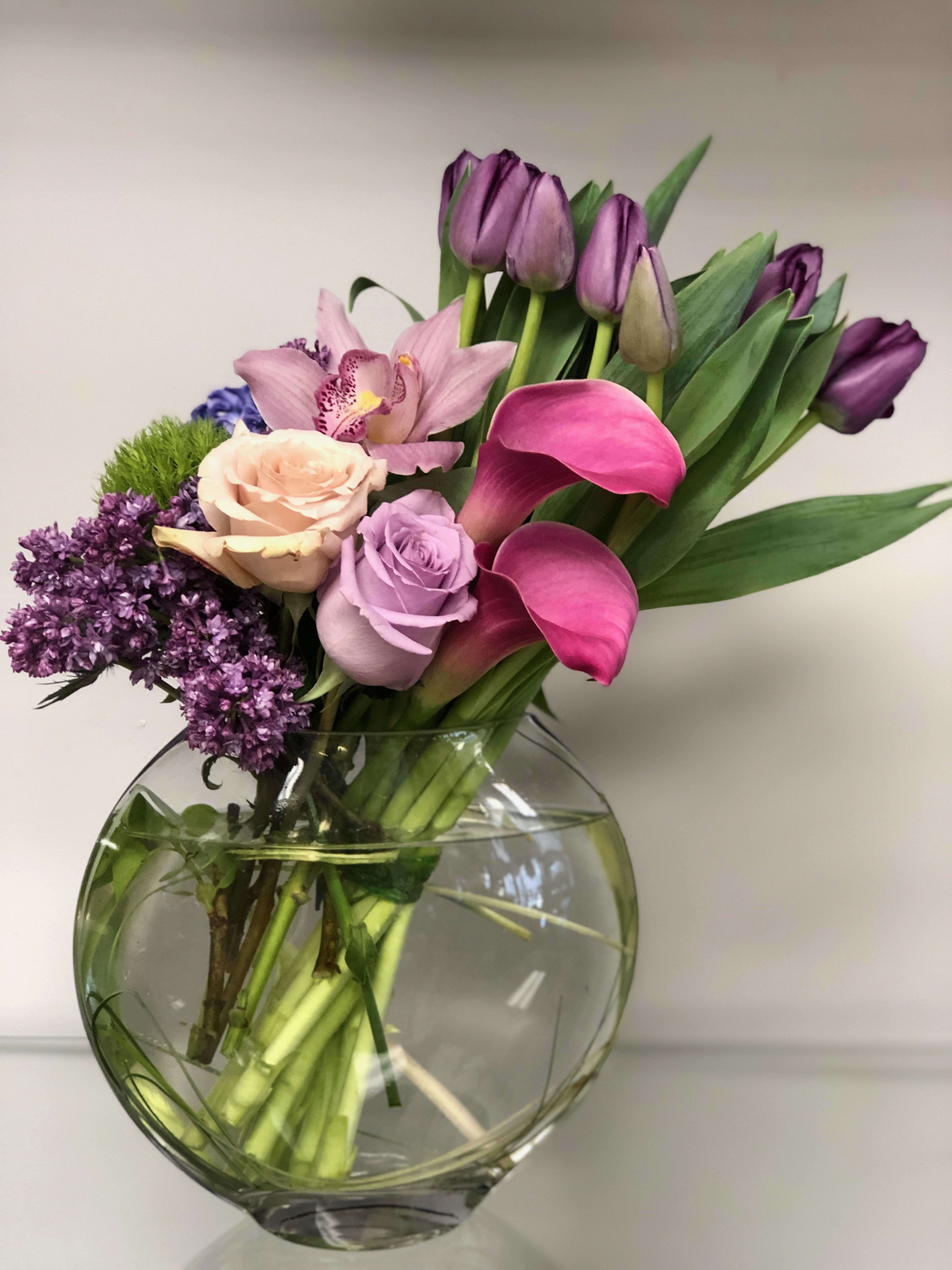 Classic PURPLE  - In this design are put together bunch od purple tulips ,calla lilies, orchid ,and lilac .Its a spring floral arrangement.