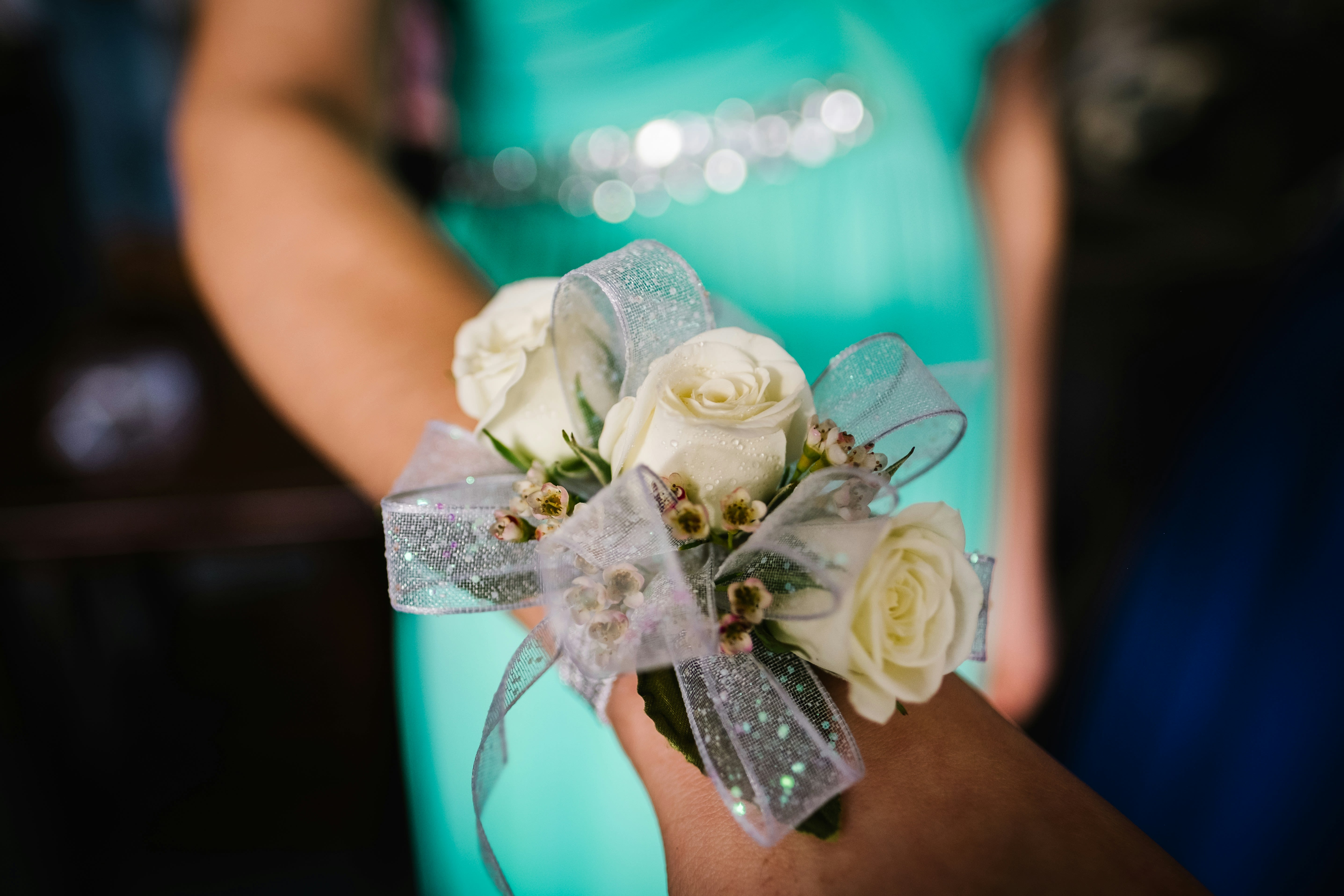 Wrist Corsage Wrist Corsage - Dress up any occasion with a custom Wrist Corsage Give us a call at 941-625-2436 to discuss your colors and floral options. We have several wrist options to choose from: traditional silver wristlet, pearls, bling and an iridescent slap