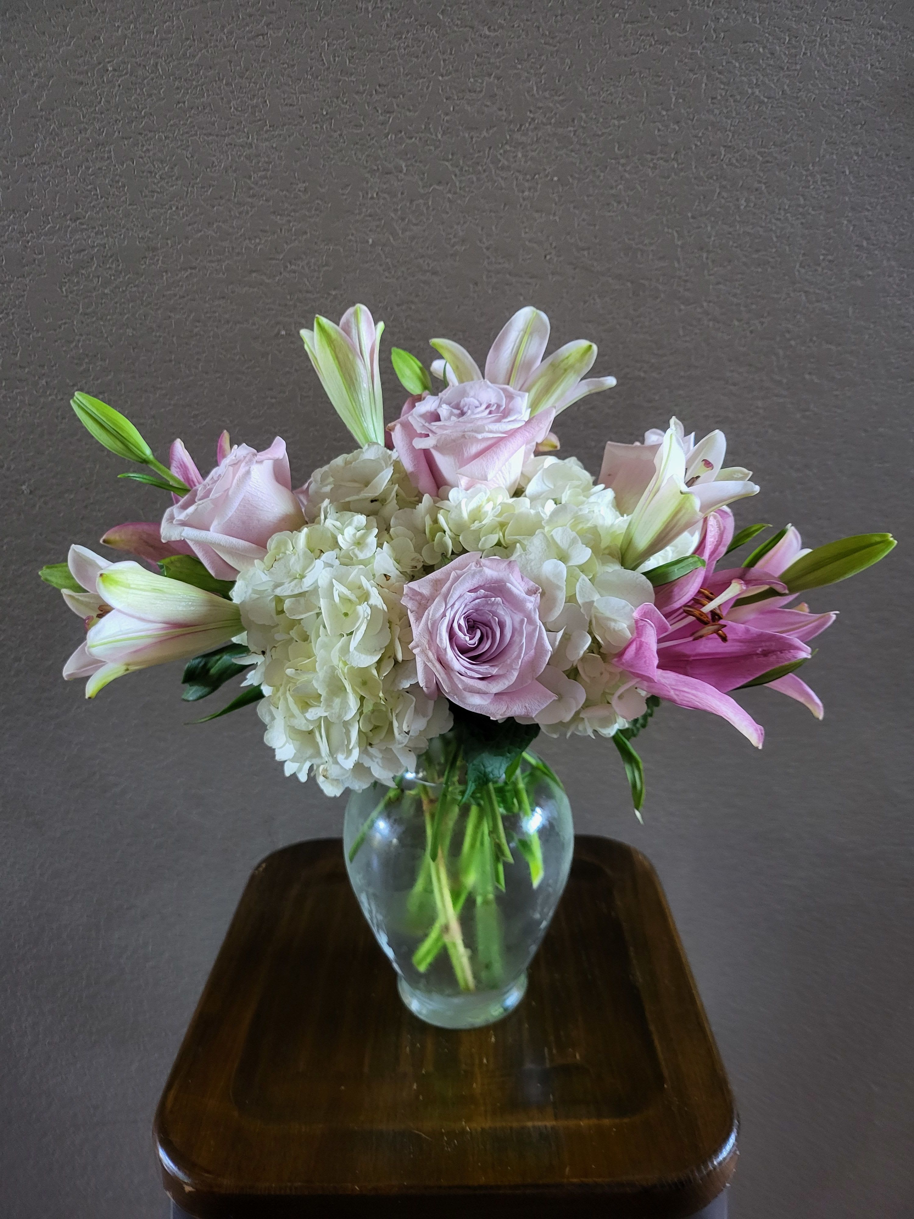 Gentle Elegance - A soft array of gentle purple, green, and white florals that emphasize a calm elegance