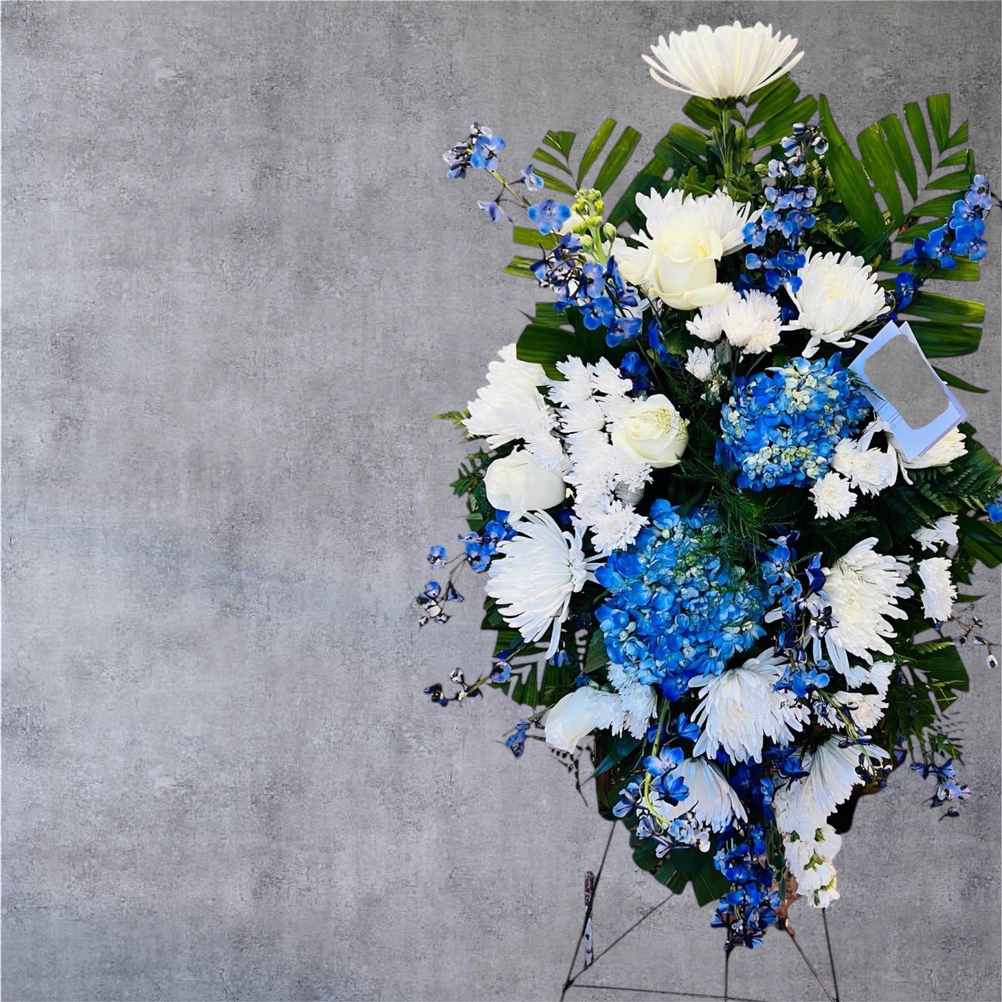 Blue Standing Spray - Beautiful with blue delphinium and blue hydrangea.