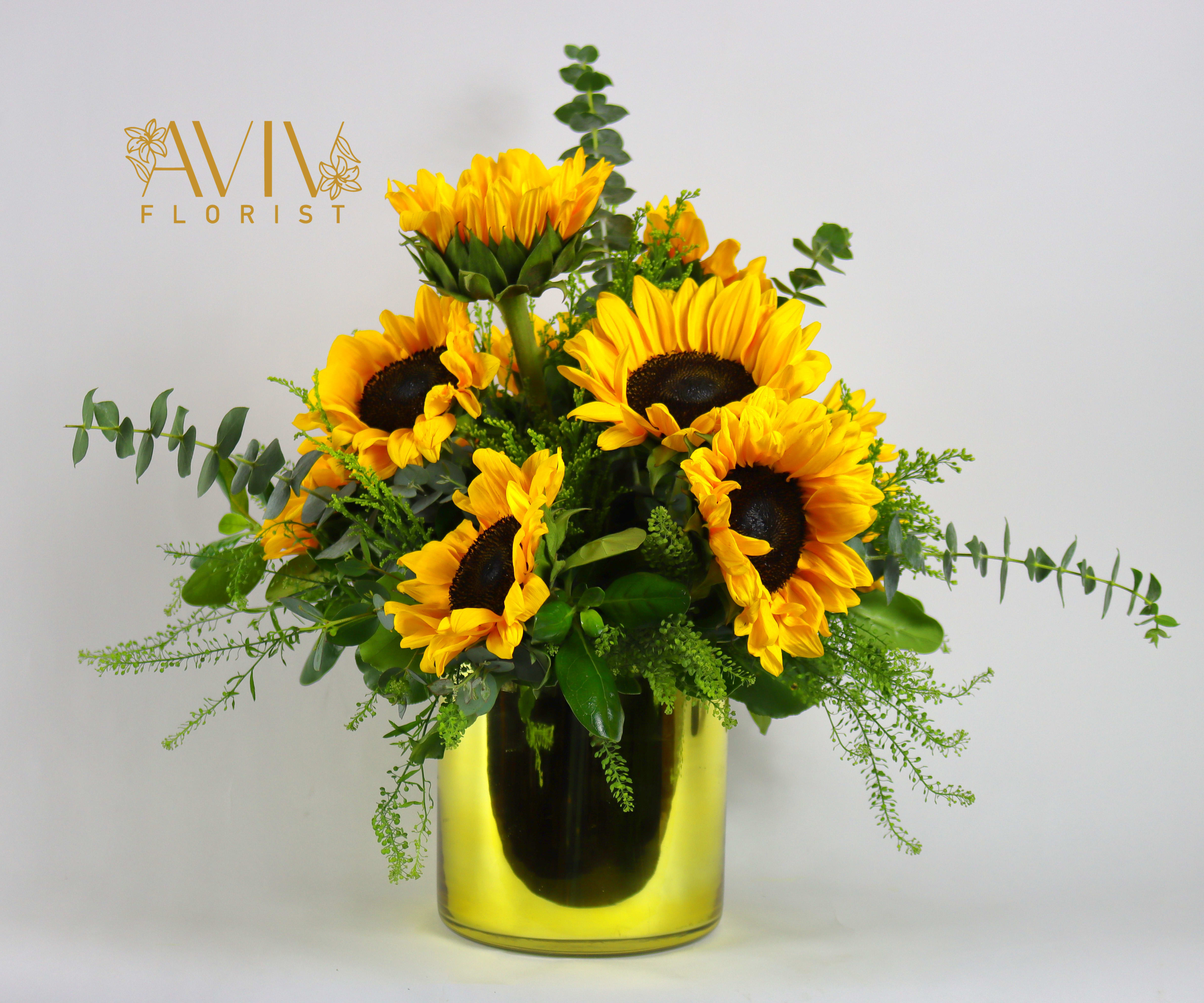 Hello sunshine! - Hello sunshine! Seasonal flowers with combination of yellow colors is delivered in a majestic, gold glass vase.