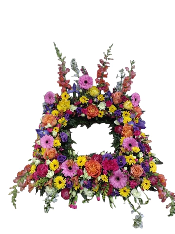Vibrant Blossom Haven - Experience &quot;Vibrant Blossom Haven&quot; – a magnificent square floral wreath that captures the essence of a blooming garden. With its rich colors and expertly curated assortment of flowers, this arrangement is not just a decoration; it's a statement piece that adds life and elegance to any setting. Elevate your space with this stunning floral masterpiece.