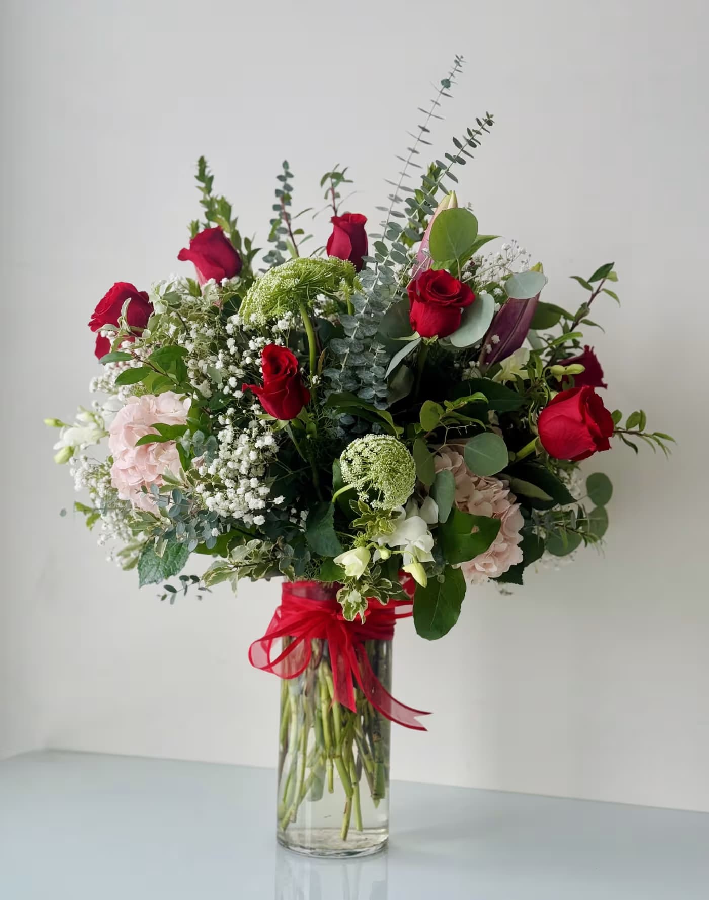 1 Dozen Roses Arrangement Premium 1 Dozen Roses Arrangement Premium - Red Roses, Hydrangeas, Orchids, Lilies, Greenery