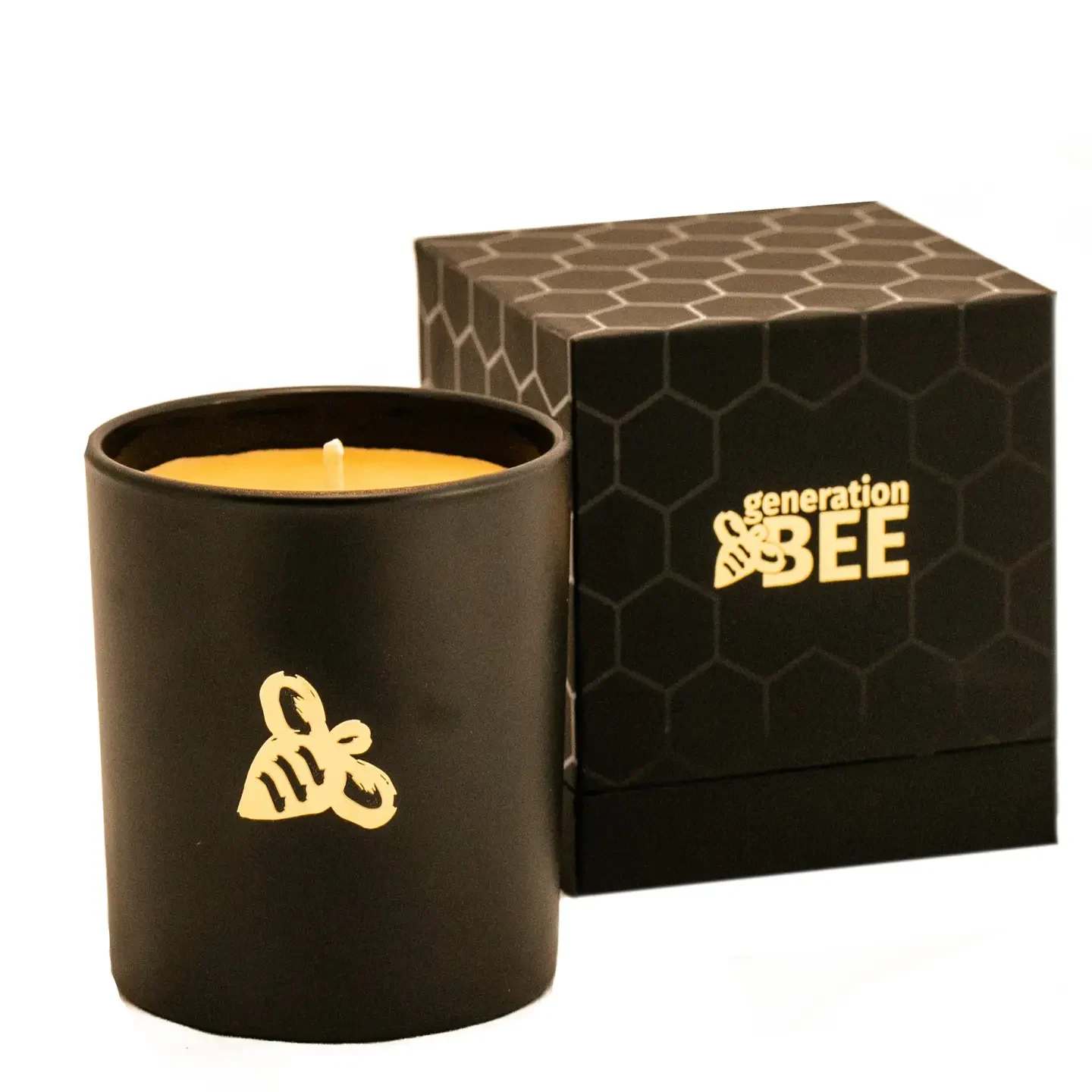 Generation Bee Beeswax Candle - Oatmeal Milk and Honey Generation Bee Beeswax Candle - Oatmeal Milk and Honey - Natural, elegant and fragrant! 100% beeswax candles. Hand poured 8 oz candles in a stunning matte black glass jar with signature gold bee logo. Each candle comes inside a luxurious black gift box with gold accents. One candle has a burn time of 30 hours. Made in United States Ingredients: Beeswax, Coconut Oil, Essential Oil Blends, Lead-Free Cotton Wick
