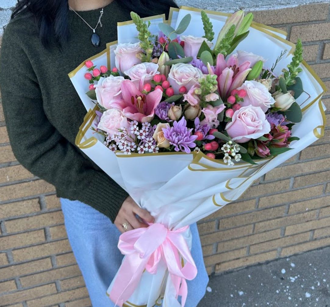 Pastels wrapped bouquet  - Can’t find the way to say sorry? Or simply any special occasion, with this stunning wrapped bouquet of pastel colors in lavenders, pinks and whites can’t go wrong.