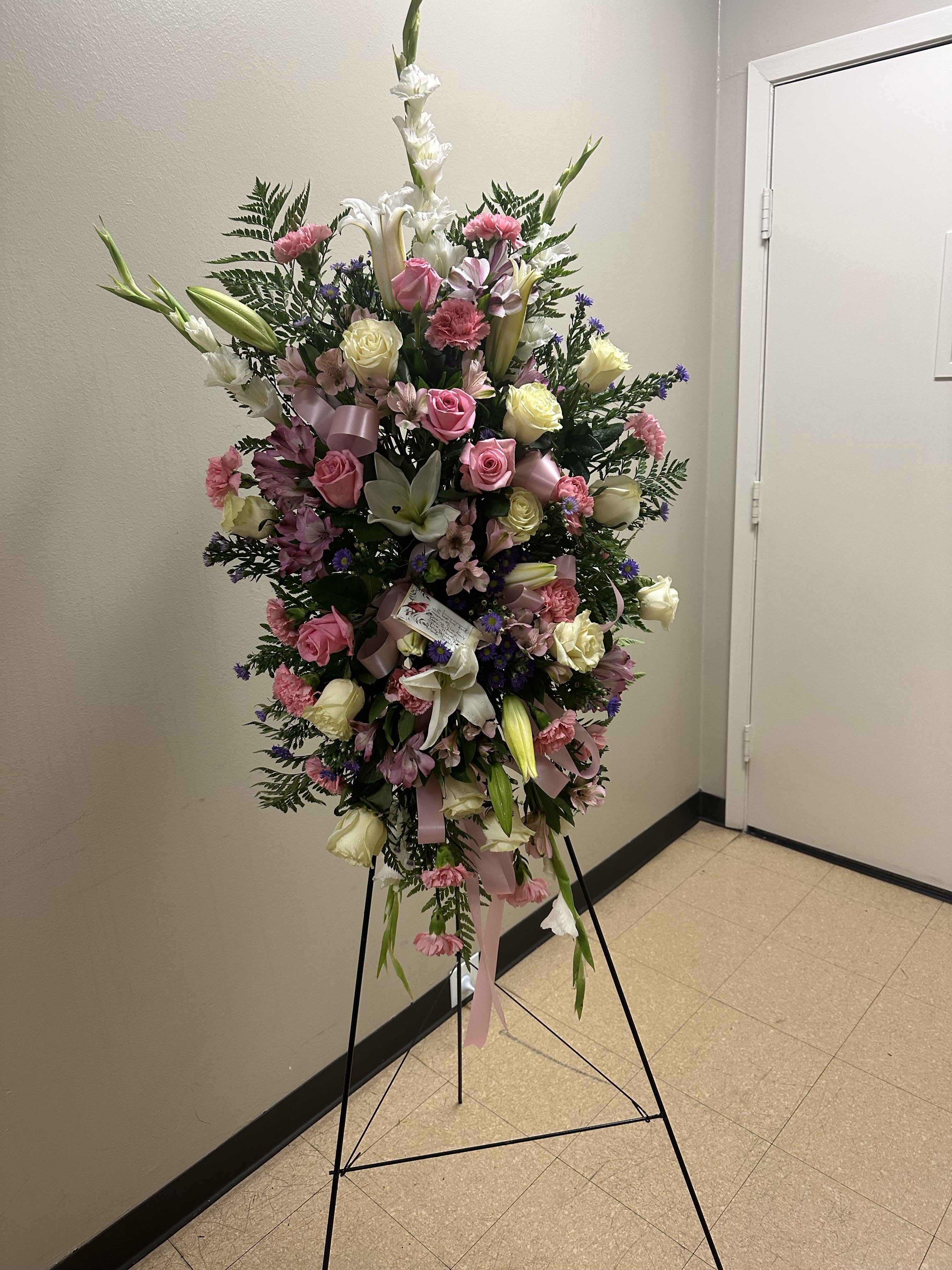 Forever and peace Forever and peace - Peaceful flowers create an unforgettably elegant spray that brings a sense of modern tranquility to the service