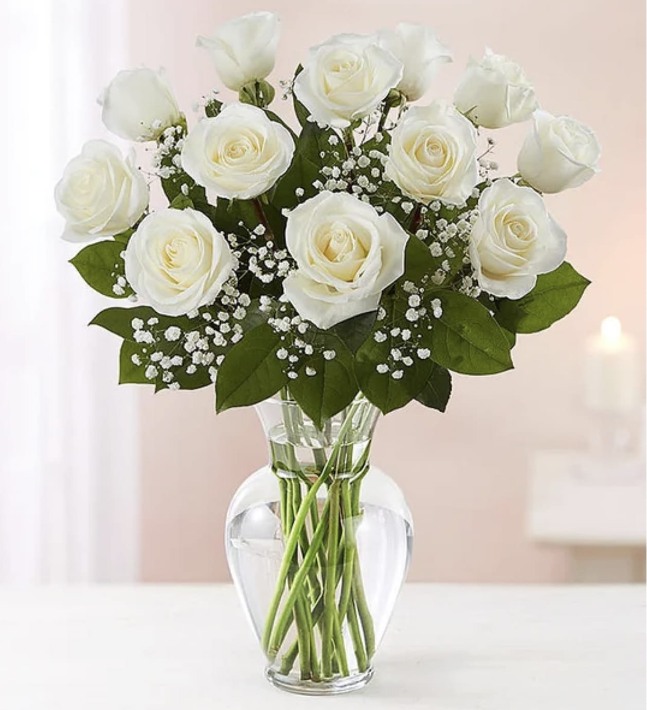 Dozen White Roses - A dozen white roses are a classic gift! Perfect for Valentine's Day, an Anniversary, or any type of celebration.  Approximate Dimensions: 20&quot;D x 30&quot;H