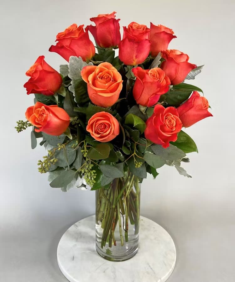 One dozen orange roses - ! dozen orange roses in a vase 