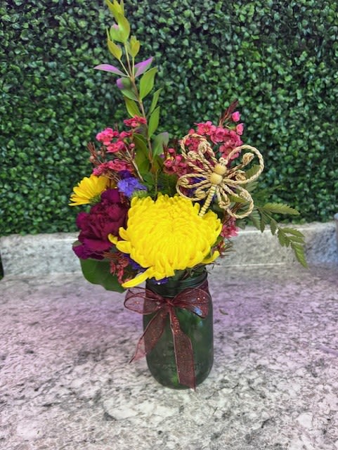 Mason Jar bouquet  - The cutest arrangement that can be made customizable with any color! Love this arrangement! 
