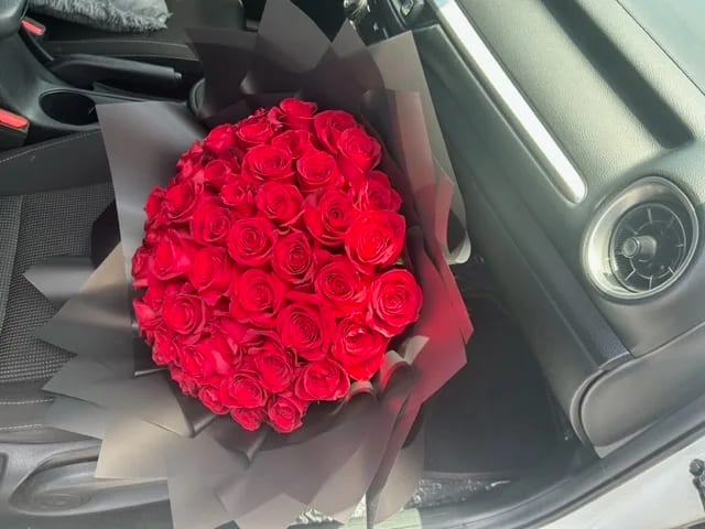 Classy - 50 Rose Bouquet - Get ready to make an impression with our 50 Ecuadorian Roses in our Classic black wrap, So elegant and classy.