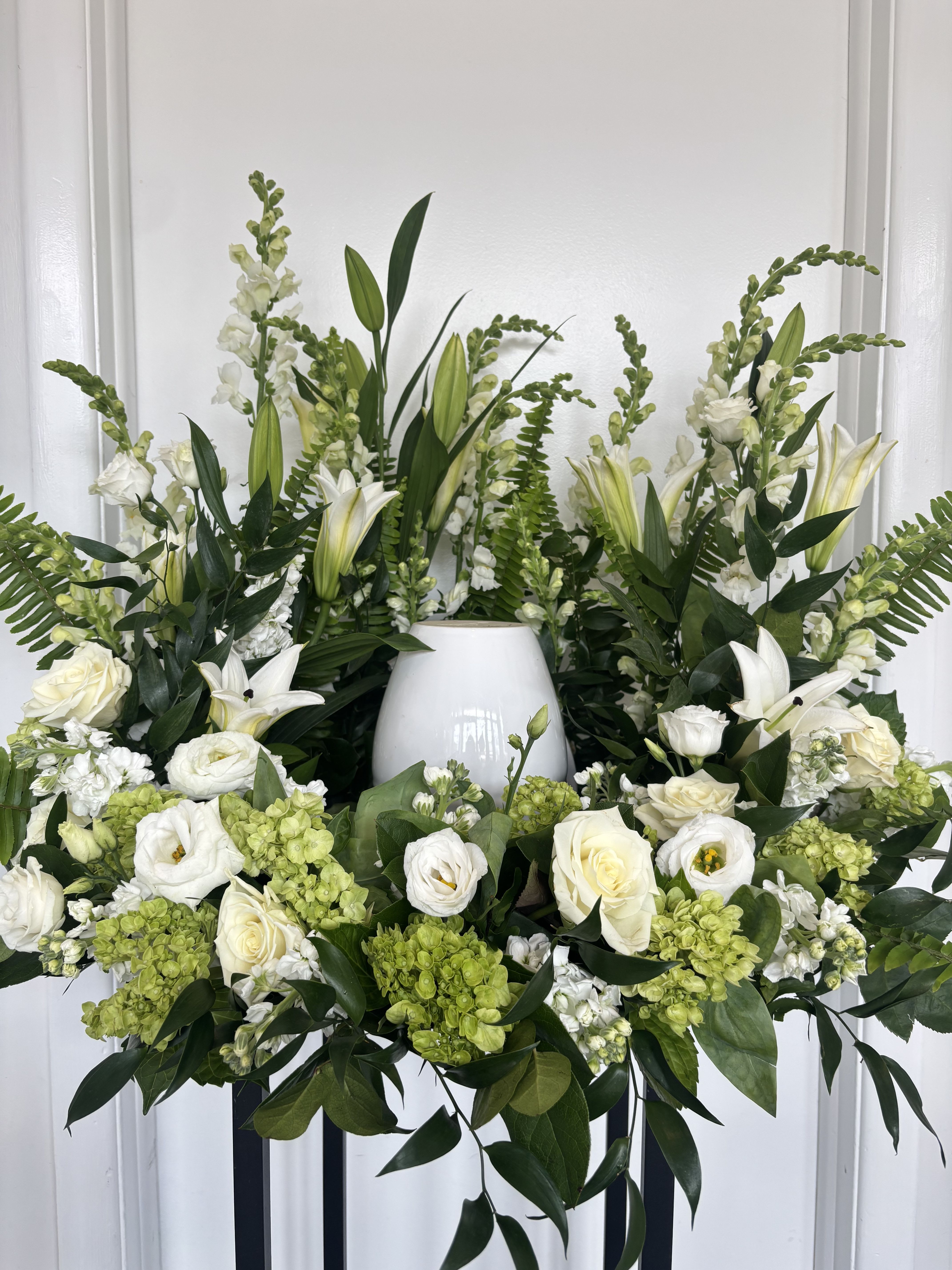 Wreath for Urn  - Green hydrangea, white roses, white snap dragon, white stock, premium greens. 