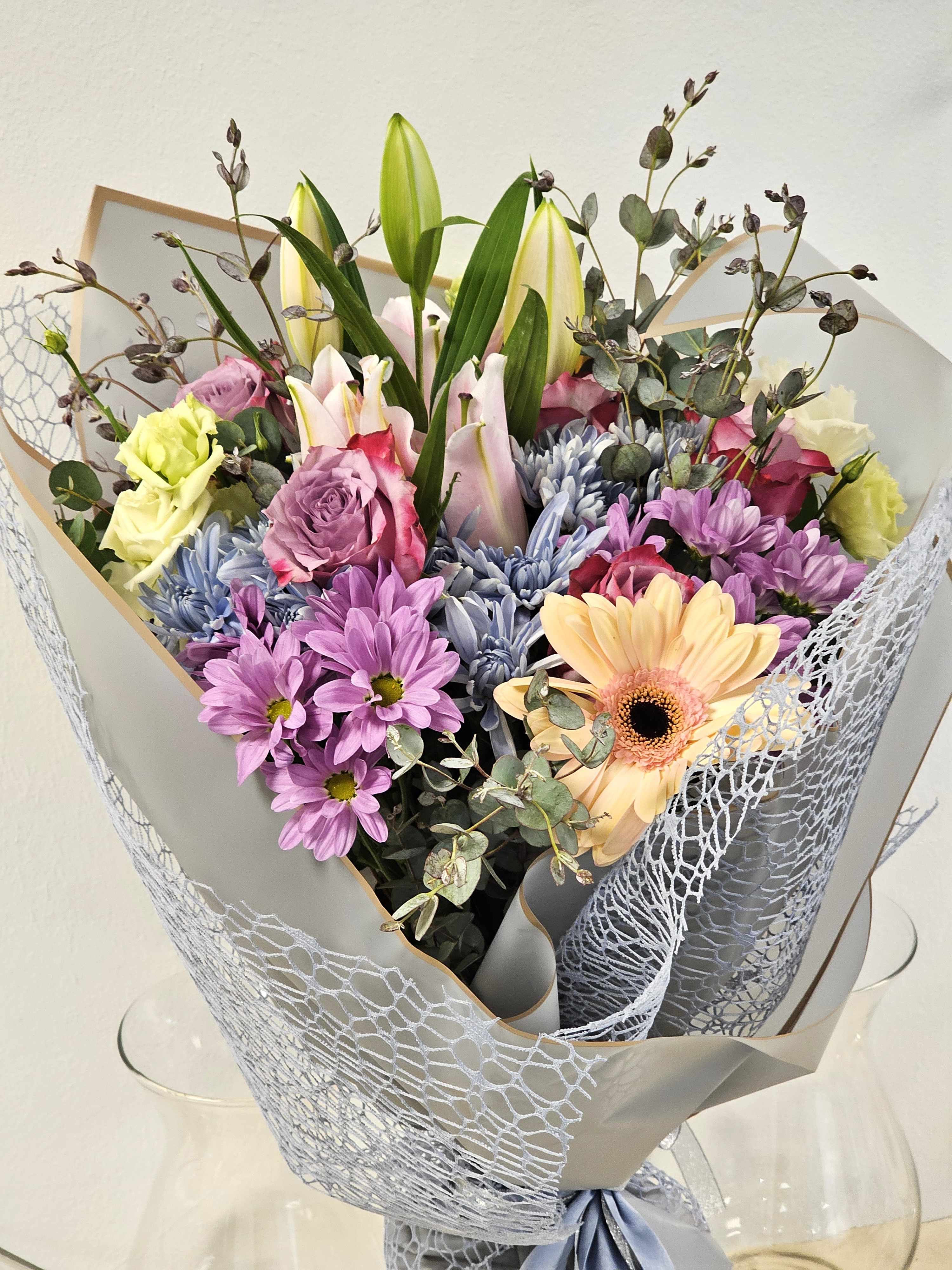 beautiful  bouquet - This elegant wrap bouquet exudes purity and sophistication, perfect for any occasion where grace and simplicity are key: