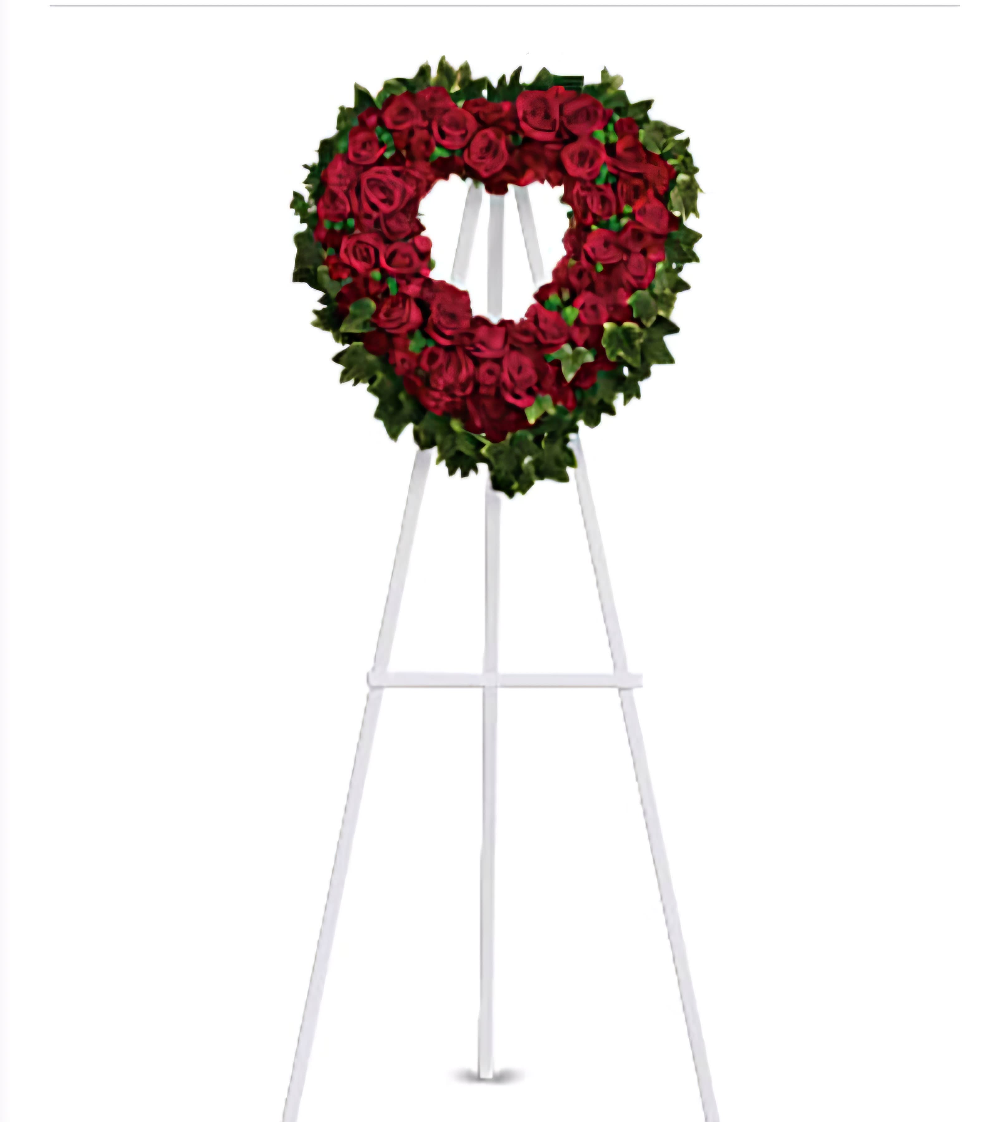 Heart shaped funeral standing spray with red roses Heart shaped funeral standing spray with red roses - Express deep love and remembrance with our Heart-Shaped Funeral Standing Spray, crafted from lush red roses to create a heartfelt tribute of enduring affection.