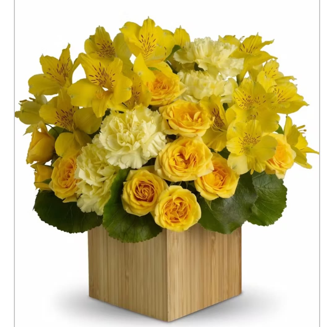 VIBRANT SKY - Beautiful wooden box with yellow roses, white carnations and astromelias.