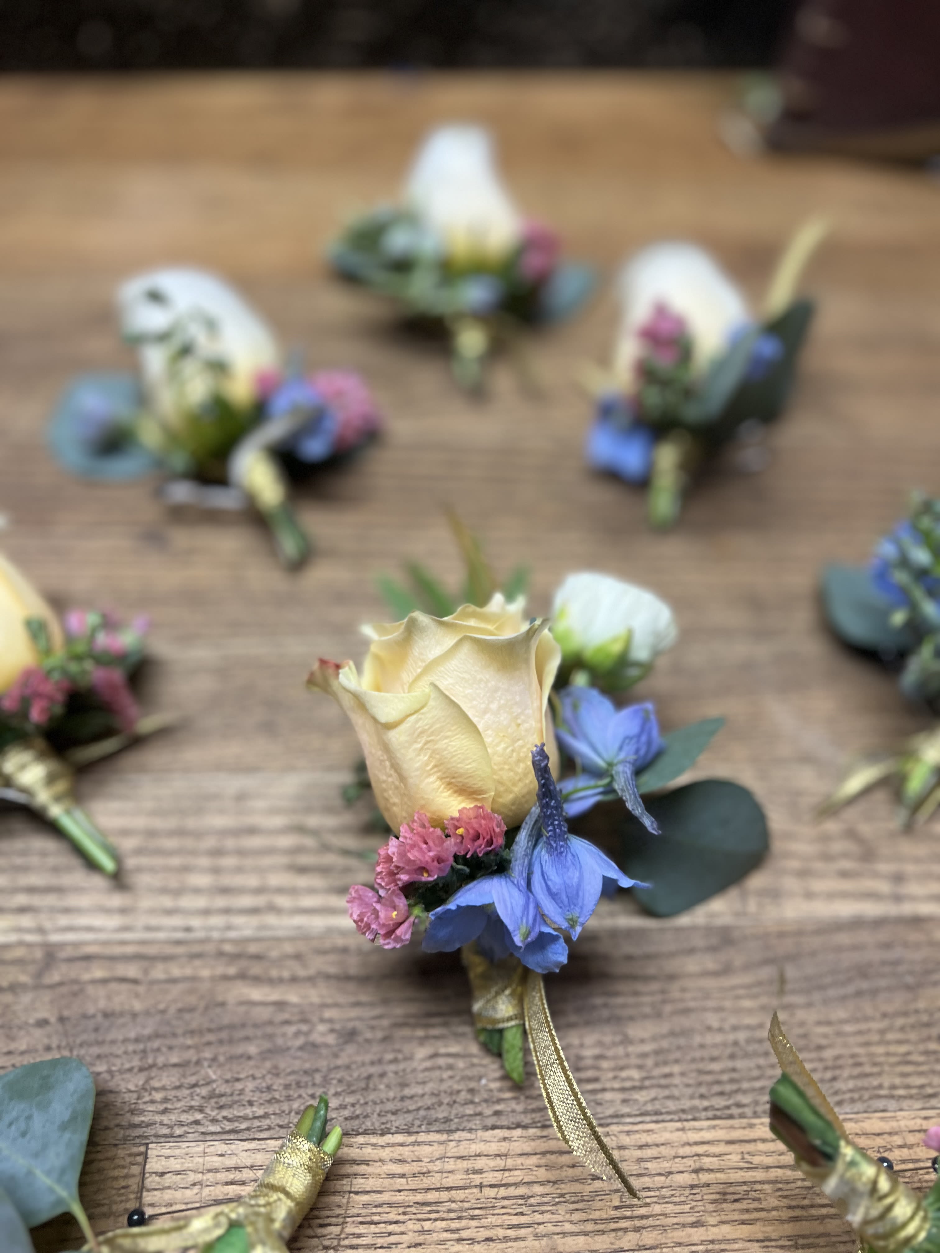 Customized Boutonnière    - Let us know what color rose and ribbon, and we’ll take it from there! Give us a call if you’re looking for a specific color.  