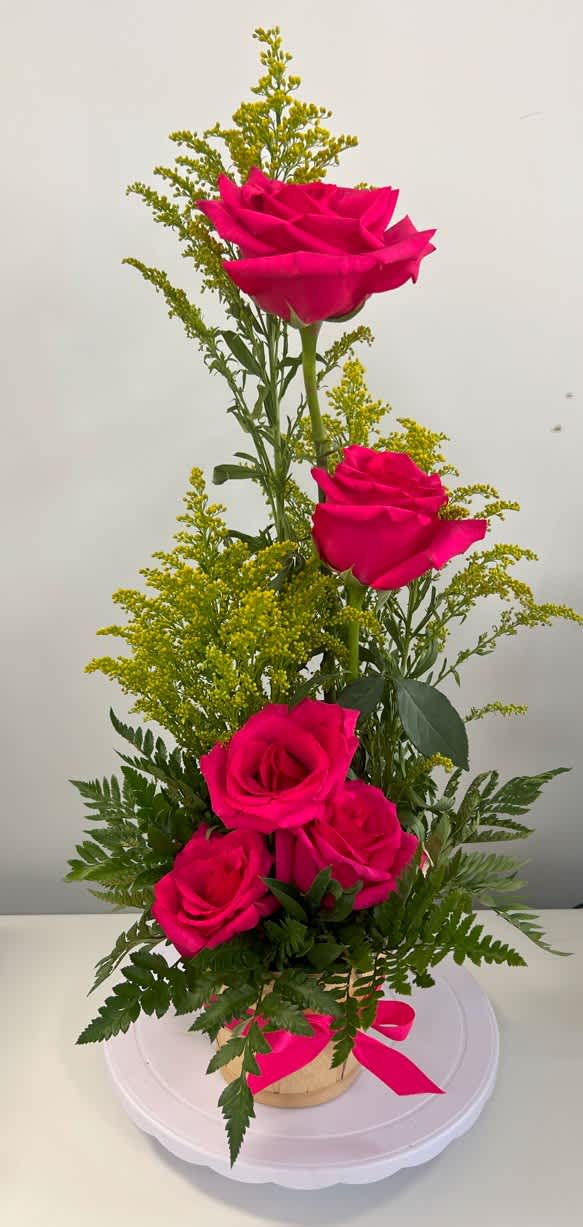 Ascending Rose Mini Basket Arrangement - 5 roses arrangement placed in a small rustic basket and decorated with leather leaves and solidago (golden rods). Other color of roses available upon request.