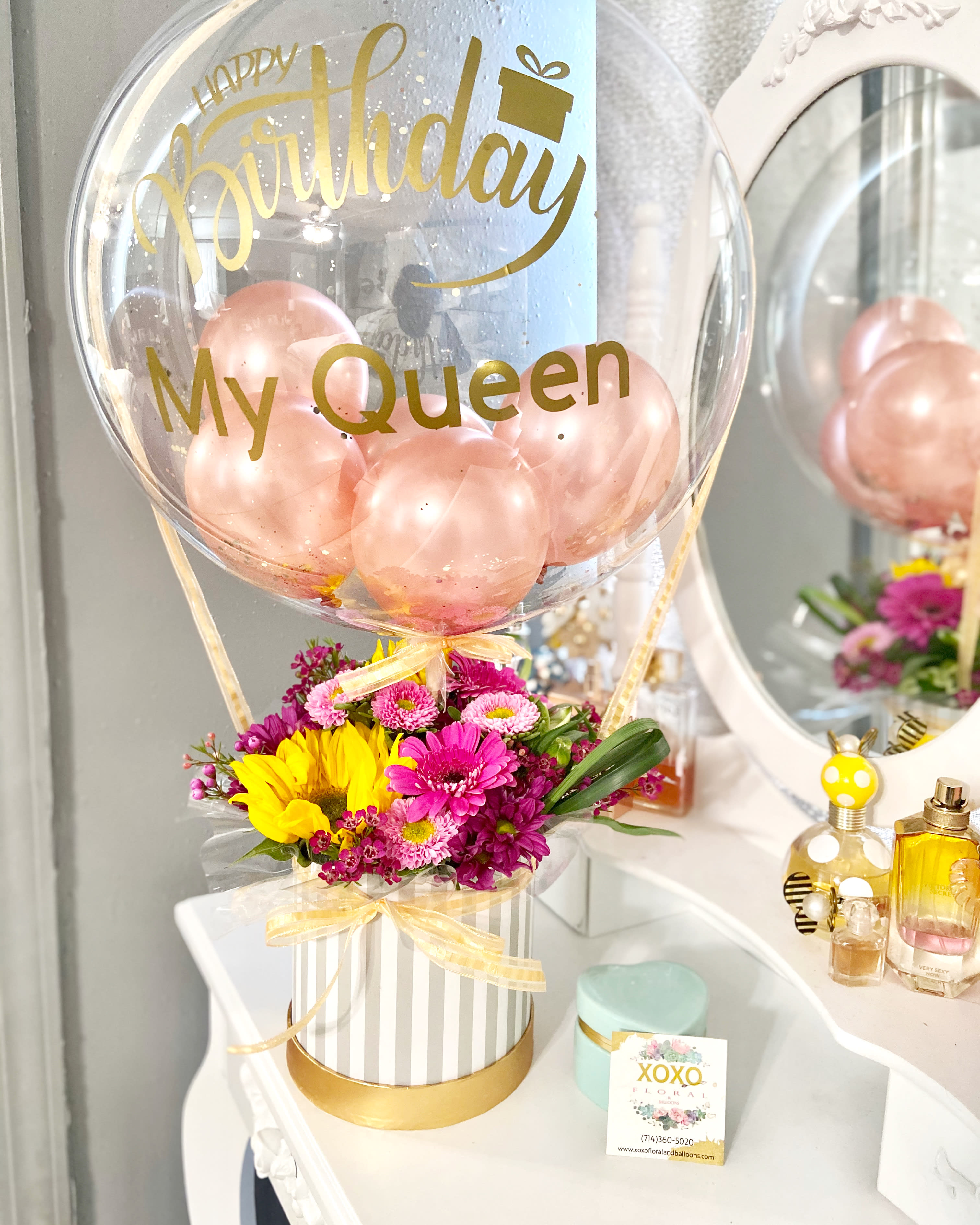 Girly birthday  - Send a customized bubble balloon with his/her name on it!  Please let us know in special instruction the name that you would like us to add!! This beautiful arrangement includes a beautiful spring mix of florals