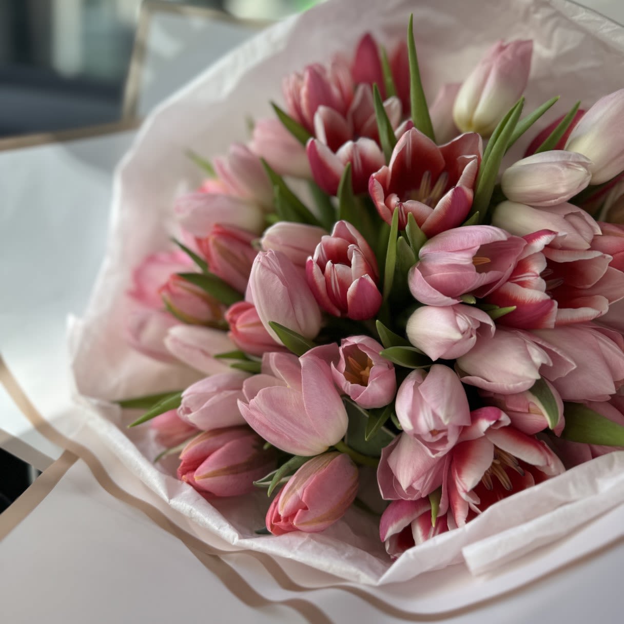 Tulip Bouquet - Delight in the elegance of tulips with this stunning bouquet, perfect for any occasion. Featuring fresh, vibrant tulips arranged with lush greenery, this design exudes simplicity and sophistication. Whether celebrating a birthday, anniversary, or just brightening someone's day, tulips convey warmth and joy with their timeless charm. Available for flower delivery in Los Angeles and nearby areas. Bring home the beauty of tulips today!