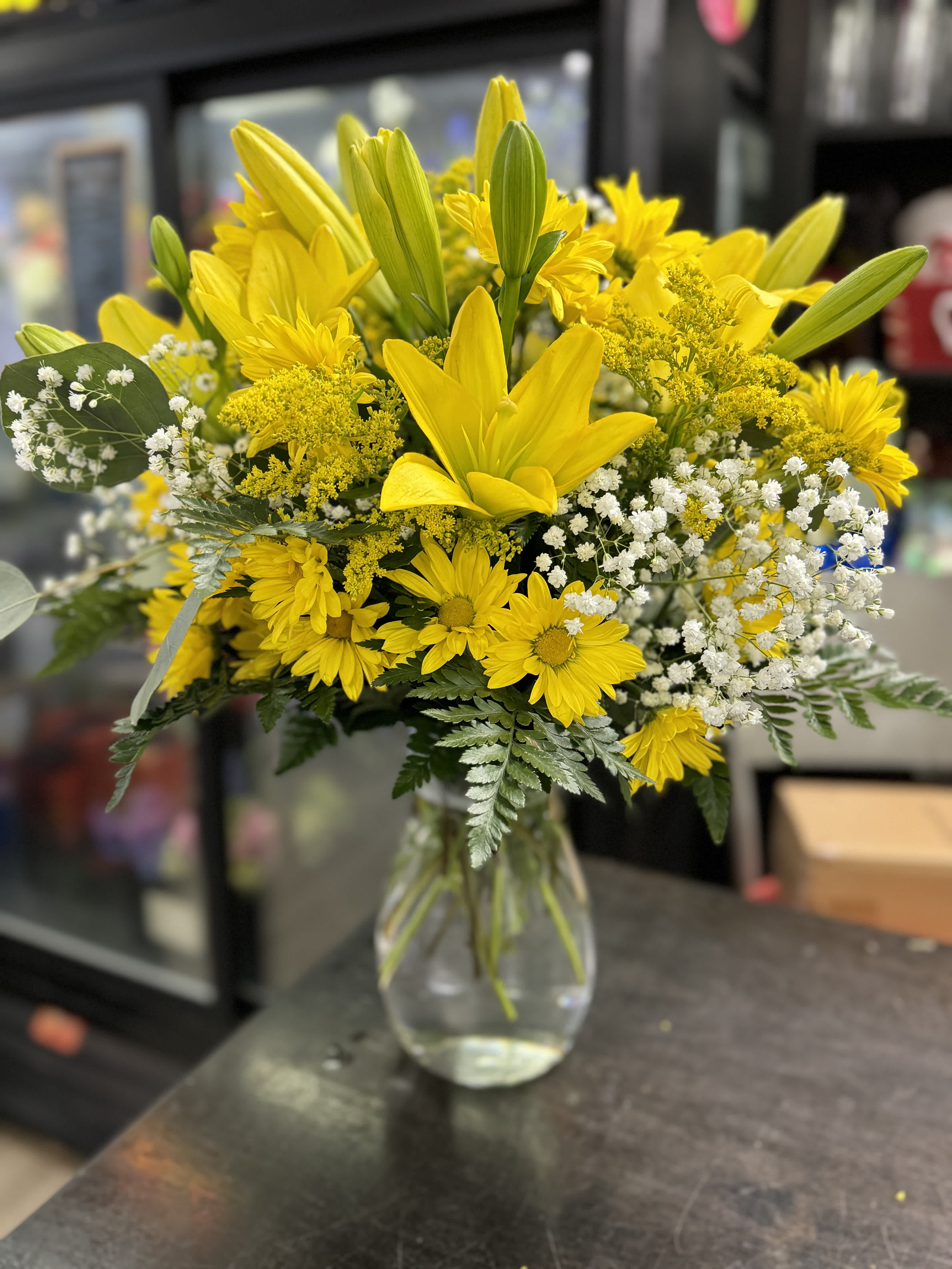 Walking on Sunshine Bouquet Walking on Sunshine Bouquet - A brilliant combination of bright, yellow healing flowers in a vase. Some blooms may vary based on our fresh inventory.