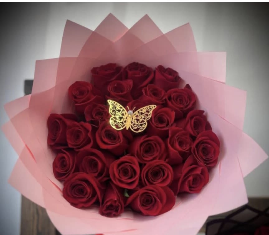 Red Rose bouquet  - 2 dozen red Roses elegantly wrapped in pink fancy tissue 