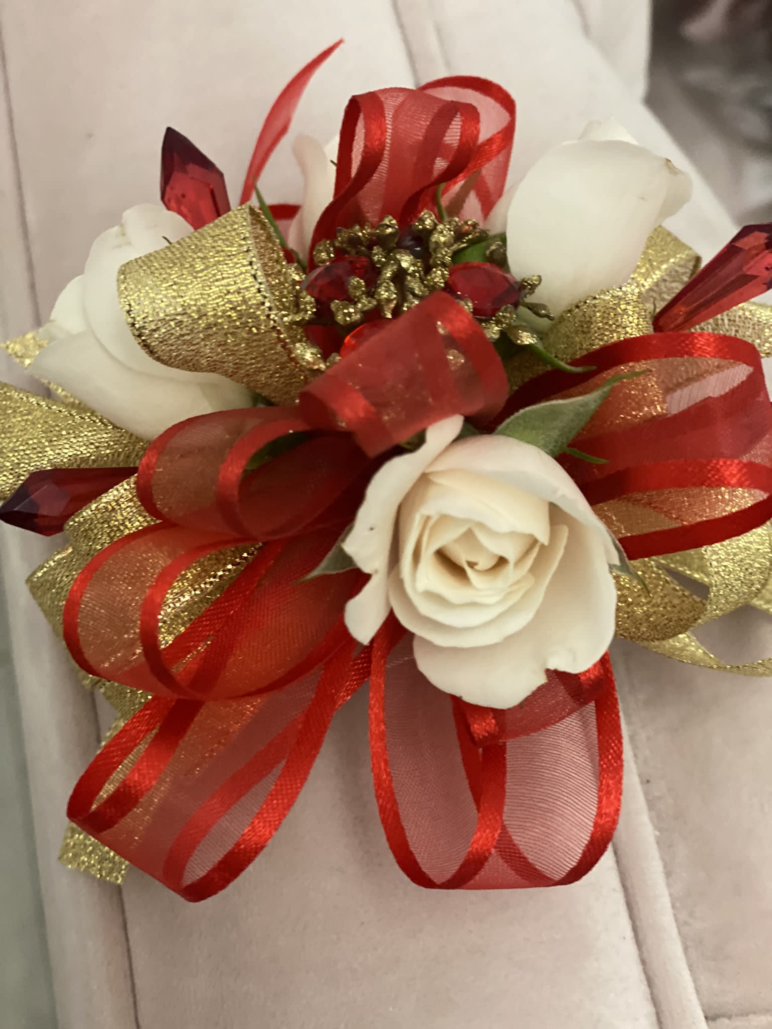 Corsage / wristlet red and gold - Corsage/ Wristlet in red and gold with gems just the perfect one to impress her