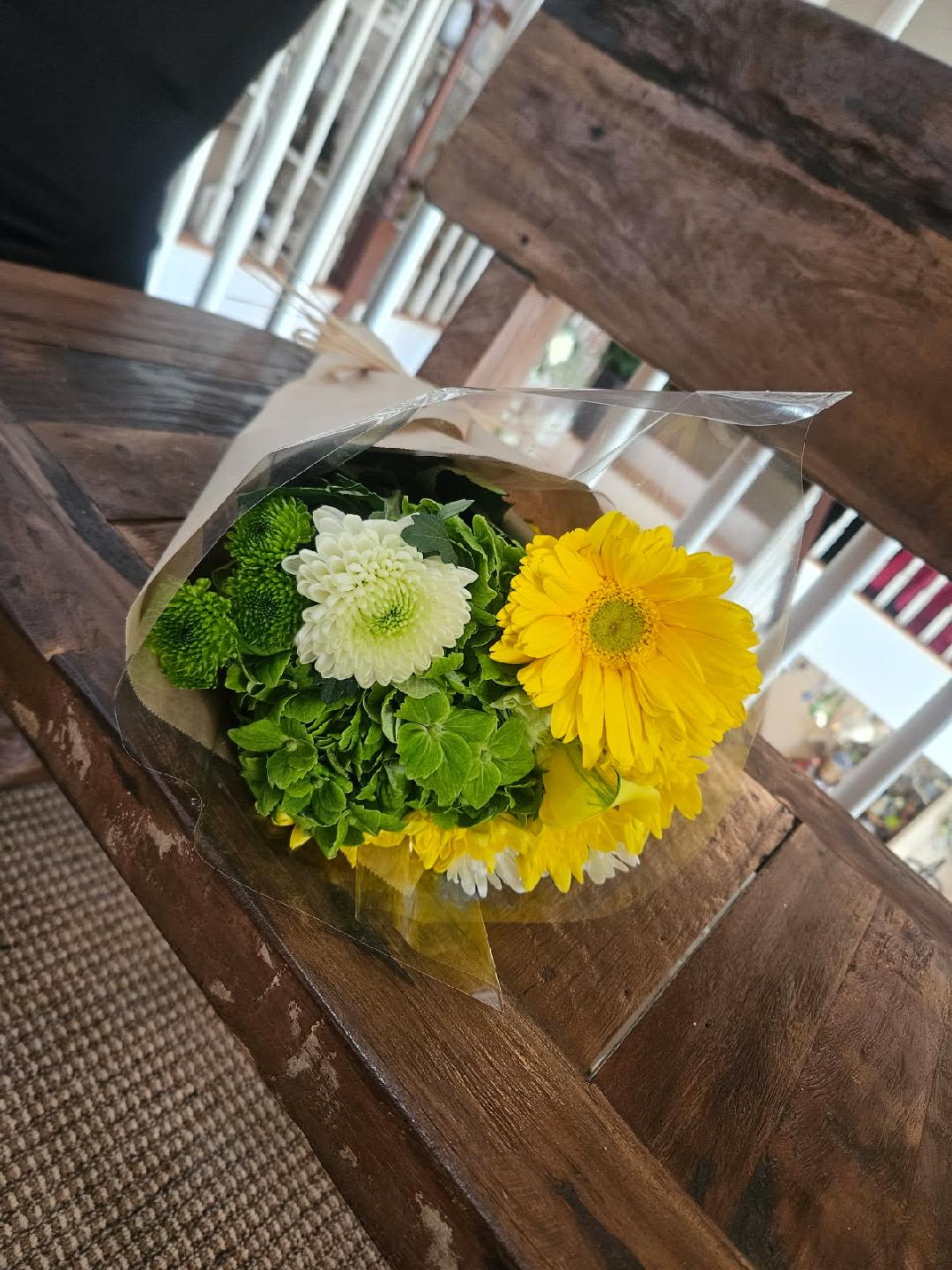 Wrapped deal of the day - Green, yellow and white wrapped flowers, loose stems