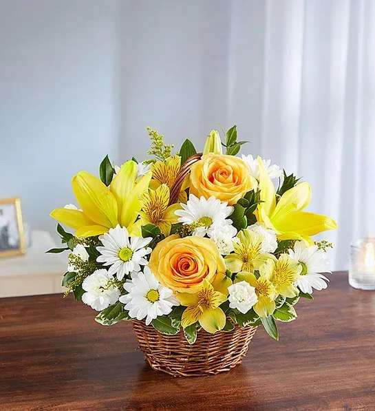 Yellow &amp; White Basket  - Basket arrangement of yellow roses, Asiatic lilies and alstroemeria and white daisy poms and mini carnations; accented with fresh greenery