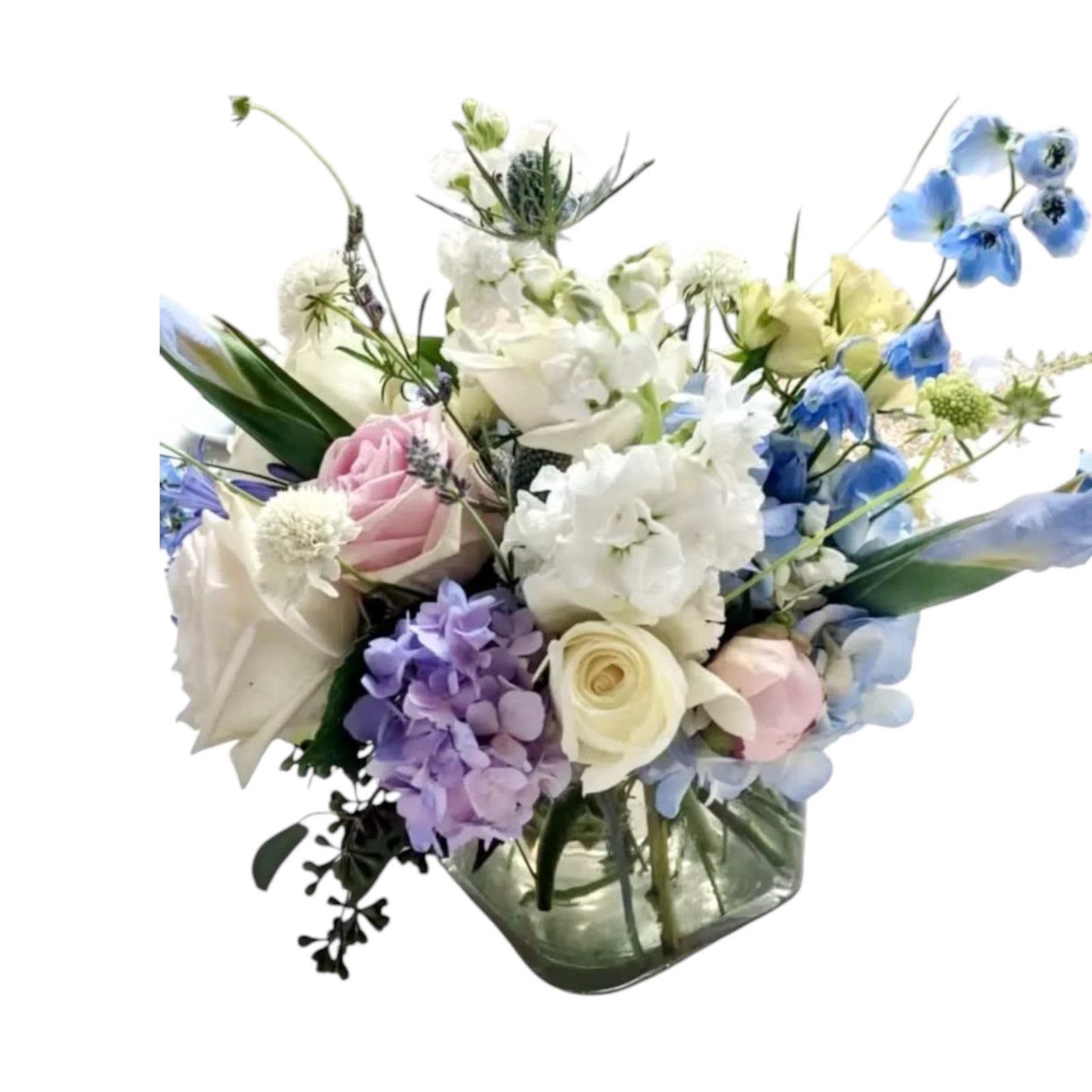 Swan Lake Swan Lake - Heirloom blooms in a short clear vase of garden roses, scabiosa, thistle, hydrangea,delphinium, stock, iris, and lily of the valley.