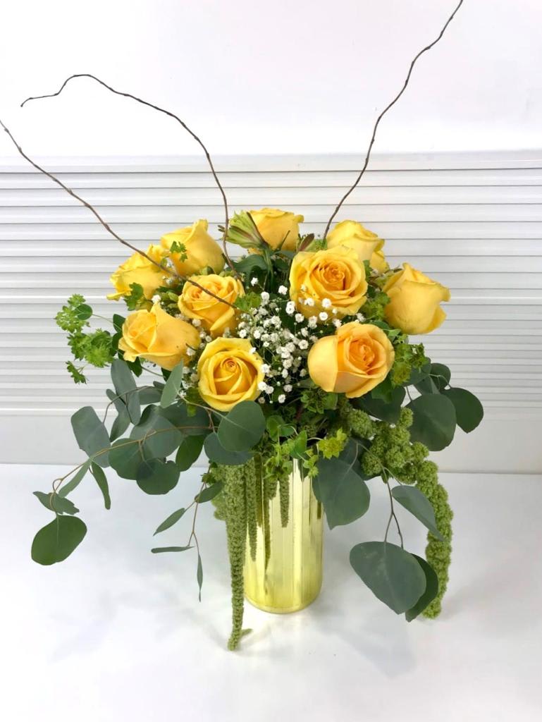 Golden Yellow Roses - Dozen Yellow rose, represents friendship, joy and caring. These beautiful sun colored roses can also convey warmth, delight, gladness and affection, as well as say good luck, welcome back, and remember me, surrounded by rich hanging amaranths.