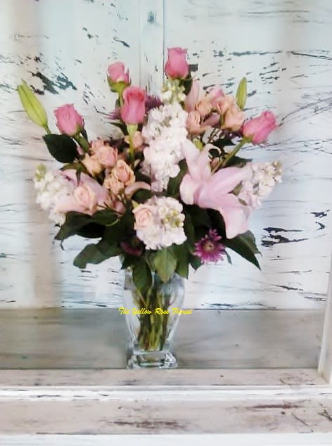 Pink Passion Pink Passion - This beautiful arrangement will fill the room with a scent she will never forget. consist of roses, stock, lilies and other beautiful blooms.