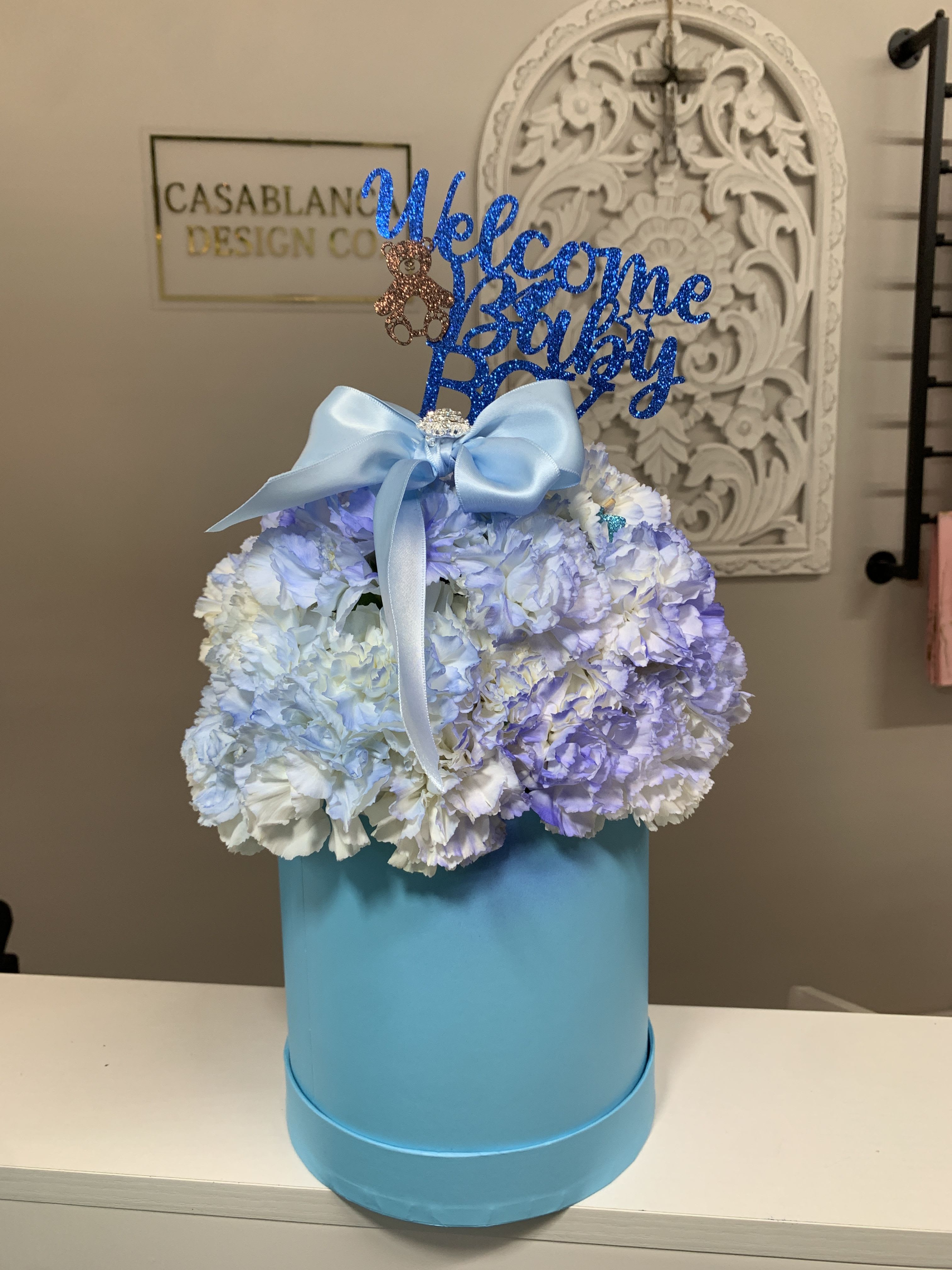 Welcome Baby Boy Welcome Baby Boy - White carnations with a hint of blue in a blue box.