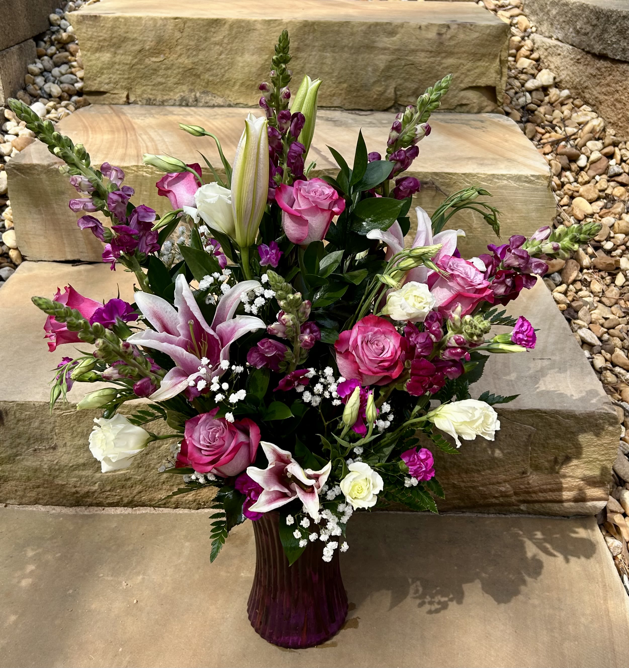 Luxury Lavender Luxury Lavender - A lavender colored bouquet of flowers in a purple vase. Perfect for those whose favorite color is purple!