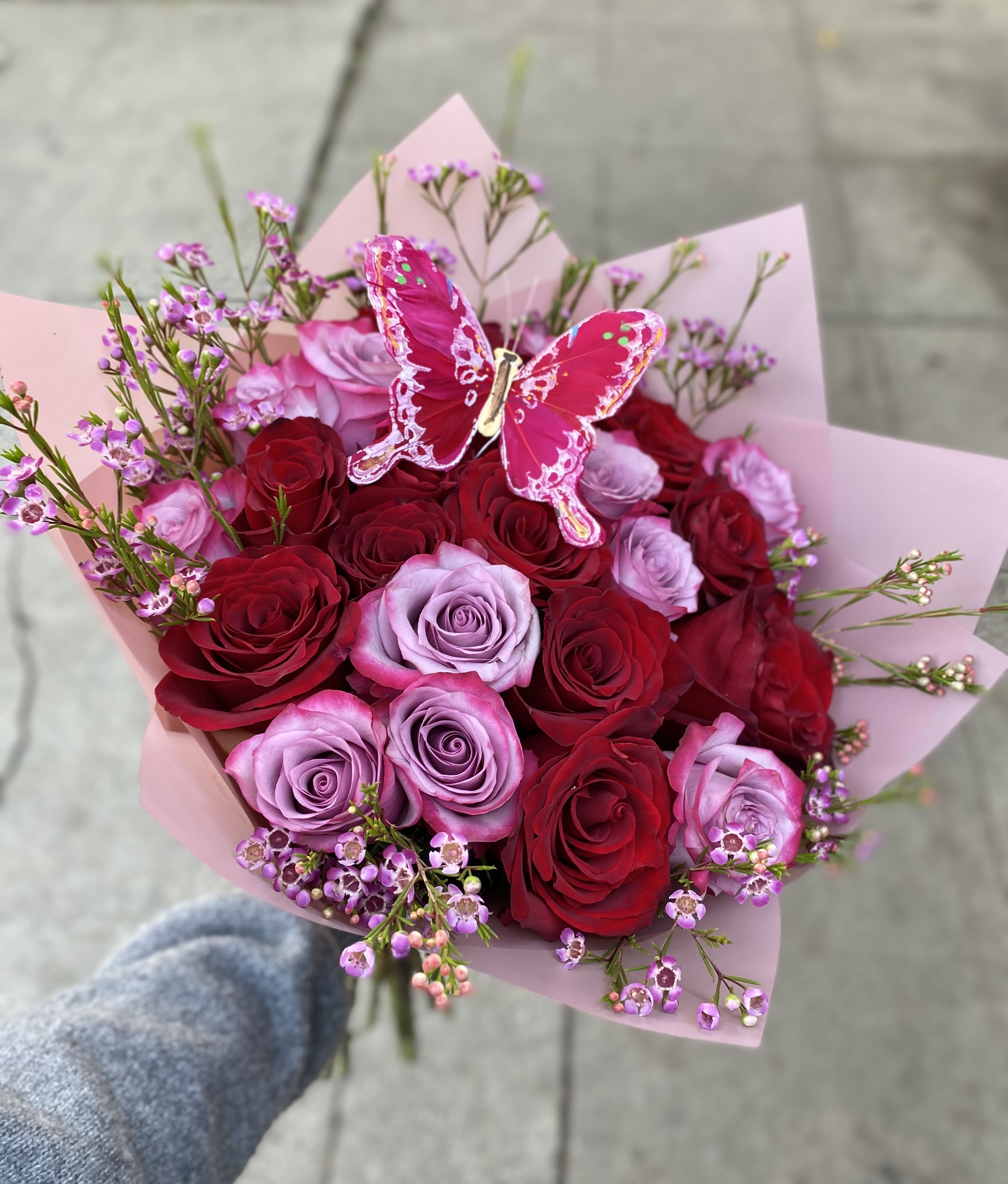 Berry Sweet Berry Sweet - Purple and red roses with filler flowers wrapped in silk paper. STANDARD: 25 ROSES DELUXE: 50 ROSES PREMIUM: 100 ROSES