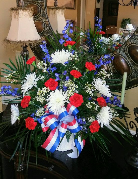 Red,White.Blue Alter Arrangement Red,White.Blue Alter Arrangement - Show your respect for solider down with our beautiful alter arrangement.