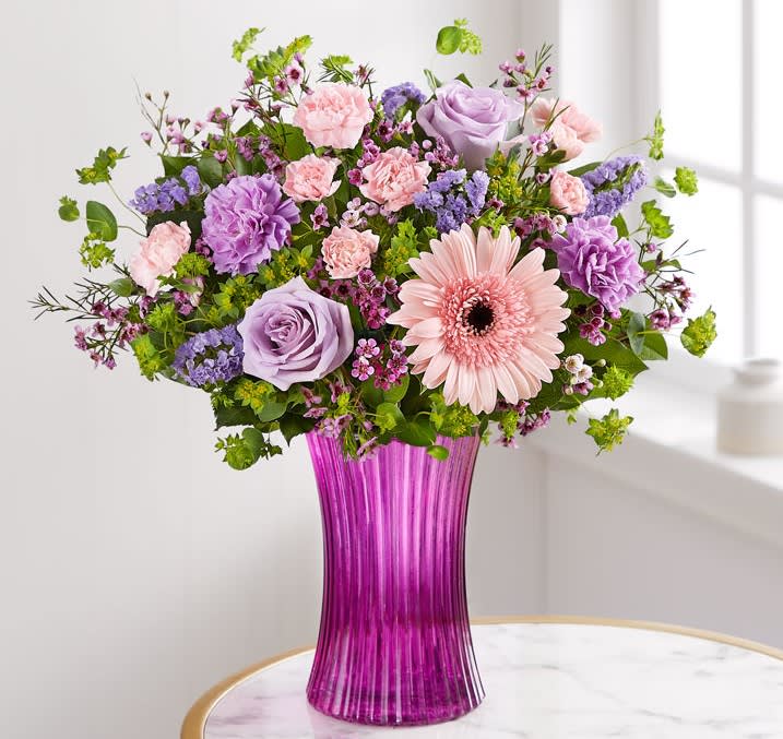 Sweet Affection Bouquet - Some sweet affection for the people you love. Our everyday bouquet is loosely gathered with a mix of pastel blooms inside our striking, new fluted violet gathering vase. Designed in vintage pressed glass with ribbed detailing, it’s a gift full of warmth and beauty.