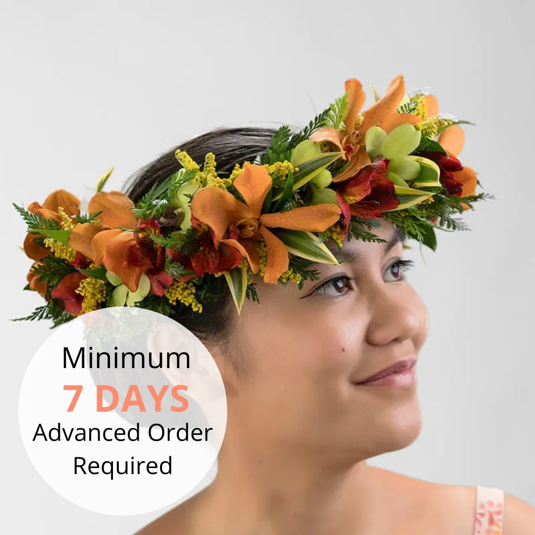 Vivid Collection Floral Halo (Crown) - Stunning, bright, and colorful, our Hawaiian style floral crown is the perfect accessory for a bride. Featuring an assortment of exotic orchids and green accents, this floral crown adds a touch of tropical elegance and vibrant beauty to your wedding day.  Key features include:  Exotic Orchids: A vibrant assortment of exotic orchids, showcasing the unique and stunning beauty of Hawaiian flora.  Green Accents: Complementary green foliage that enhances the bright colors of the orchids, adding texture and depth.  Perfect for Brides: Designed to be a stunning and elegant accessory for any bride, adding a touch of Hawaiian charm and sophistication.  High-Quality Arrangement: Expertly crafted to ensure freshness and durability, making it perfect for your special day.  Versatile Elegance: Ideal for beach weddings, garden ceremonies, or any outdoor celebration, this floral crown adds a touch of tropical elegance.  Celebrate your wedding with our Hawaiian Style Floral Crown, a breathtaking and elegant accessory that embodies the spirit of Hawaii.