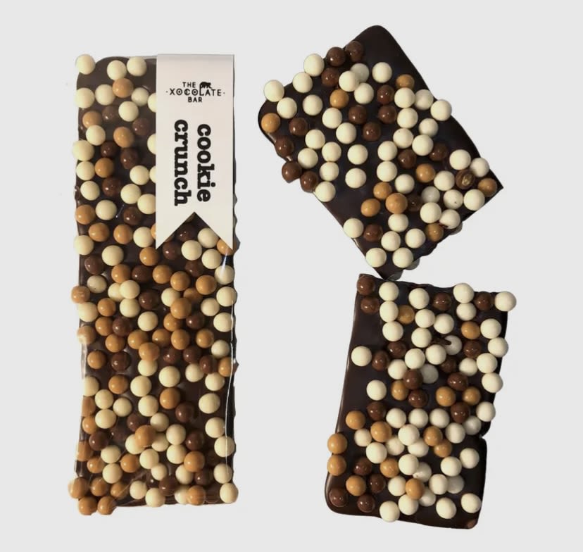 Cookie Crunch - Dark Milk and White Chocolate Bar Cookie Crunch - Dark Milk and White Chocolate Bar - Cookies and chocolate--what's not to like? We load our organic fair trade dark chocolate with French cookie pearls. Each little bead is a crunchy cookie core surrounded by milk or white Valrhona chocolate.