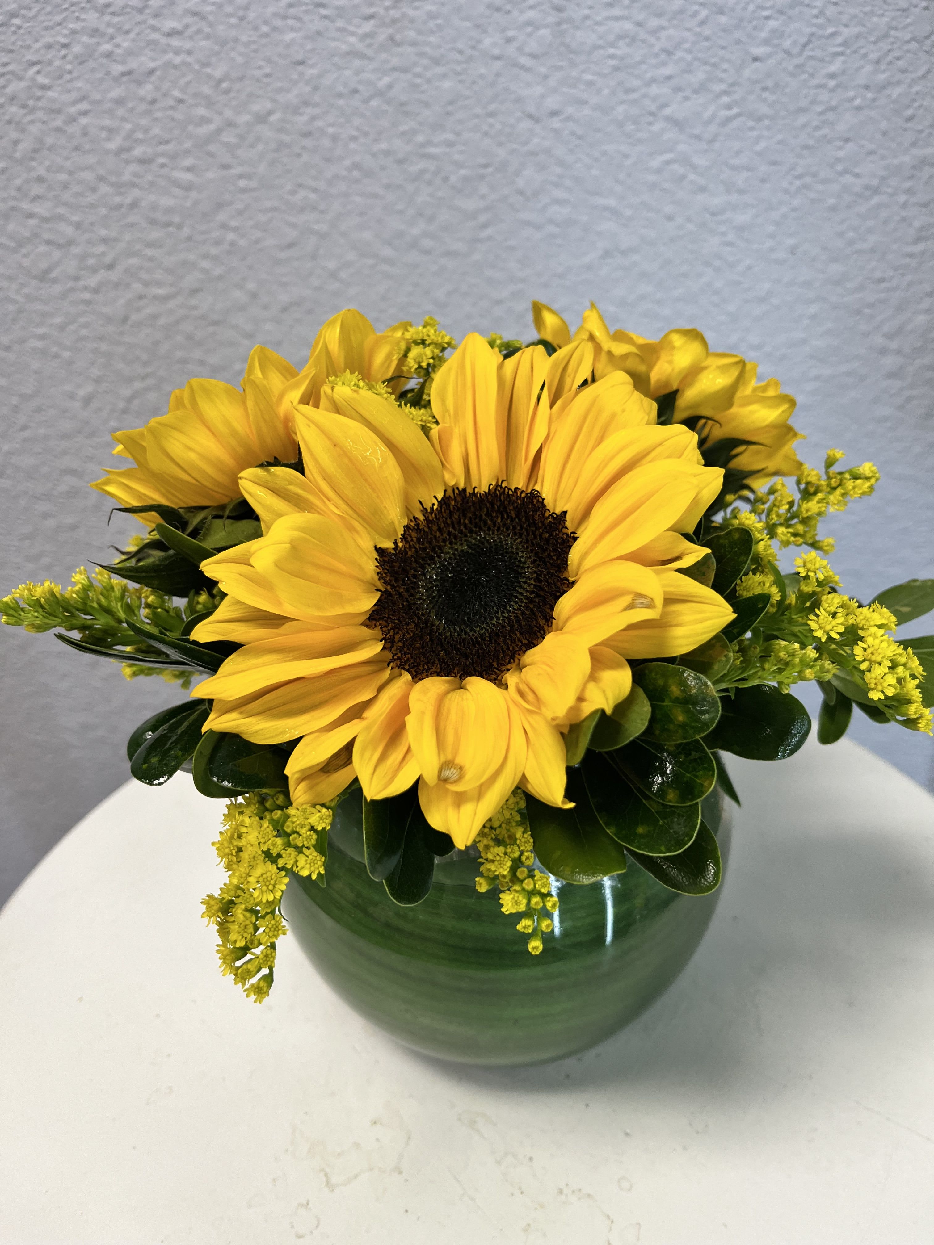 Sunflower Sunshine Bouquet Sunflower Sunshine Bouquet - Sunflower Sunshine Bouquet adds a burst of happiness to any event or occasion. Beautiful sunflowers are presented in a clear glass bubble bowl vase. This exquisite fresh flower bouquet will make an excellent Birthday, Get Well, Anniversary or any occasion gift.
